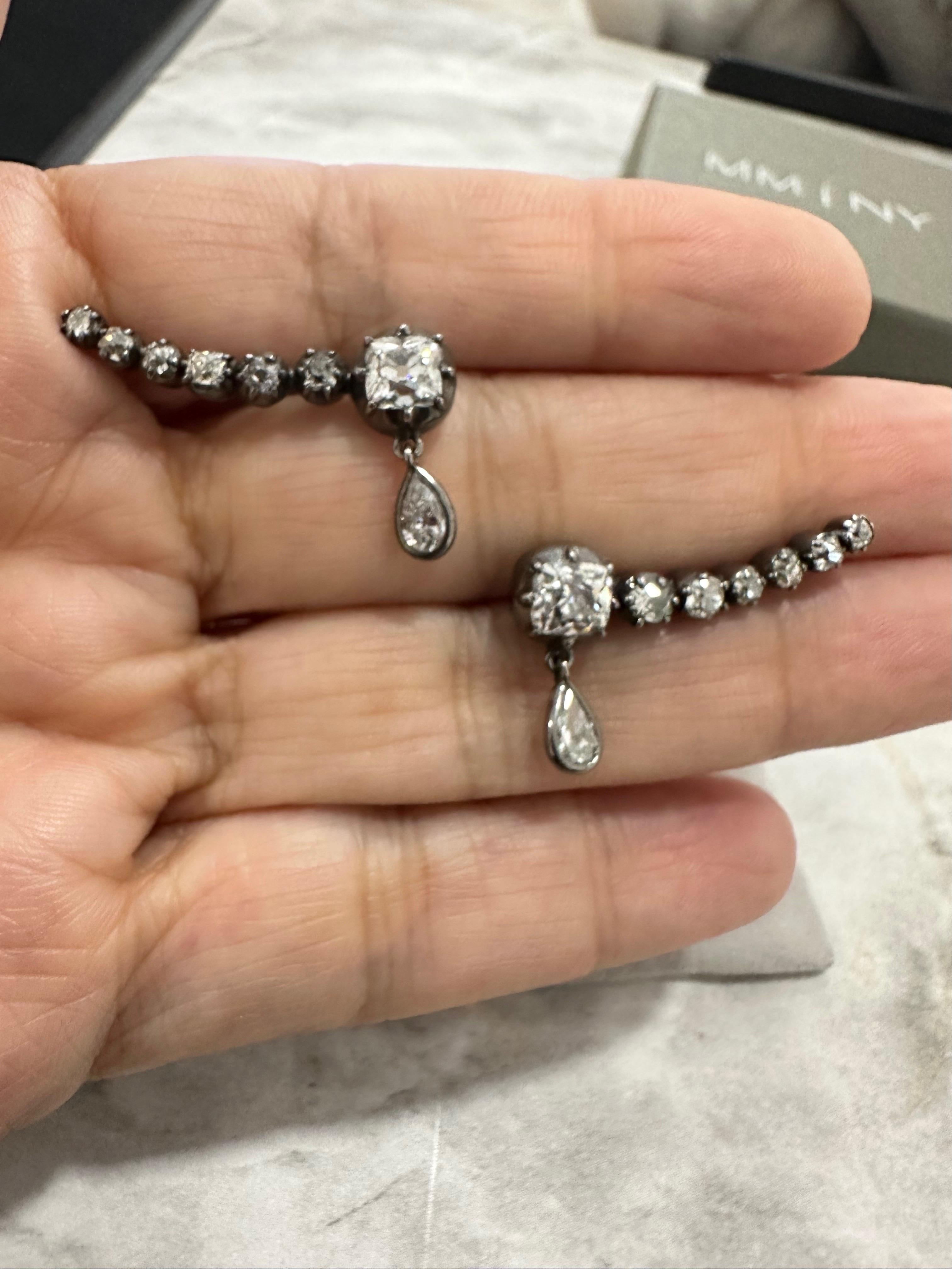 We love old cushion cut diamonds at MMNY. From our Reconceived Collection these ear climber earrings have the character of old world and the glamour and style for todays lifestyle. The pear shape dangling earring adds a little something extra.