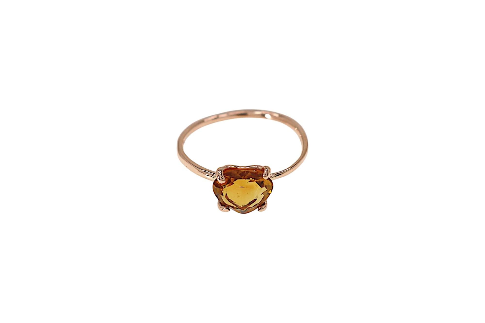 Contemporary ring handmade in 9 carat rose gold with old cut citrine, 0.27x0.31 inches. Finger size: US size 6, Italian size 12, UK size M, French size 52. The ring can be re-sized to the customer's size before shipping. Marked with 9 carat gold