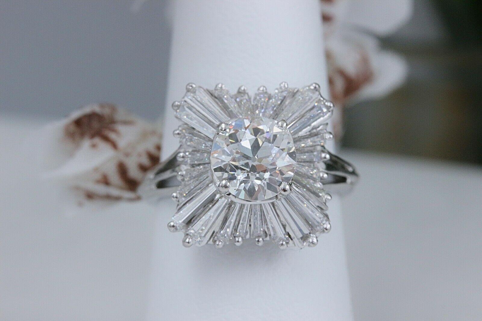Women's or Men's Old Cut Diamond 3.56 Carat Ballerina Ring with Tapered Baguettes in Platinum