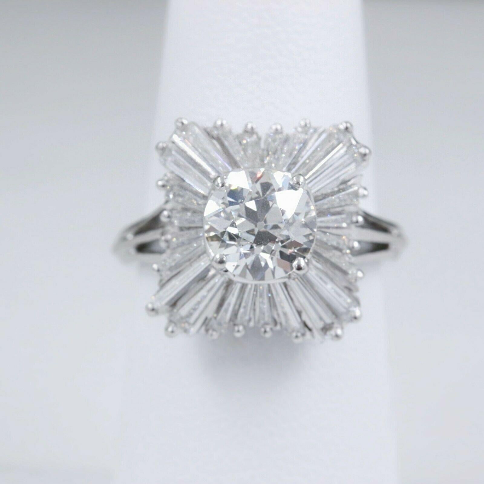 Old Cut Diamond Ballerina Ring with Tapered Baguettes

Style:  Ballerina
Serial Number:  GIA 2205007552
Metal:  Platinum
Size:  6 - sizable
Total Carat Weight:  3.56 tcw
Diamond Shape:  Old Cut Diamond 1.56 cts K color, VS2 clarity
Accent Diamonds: 