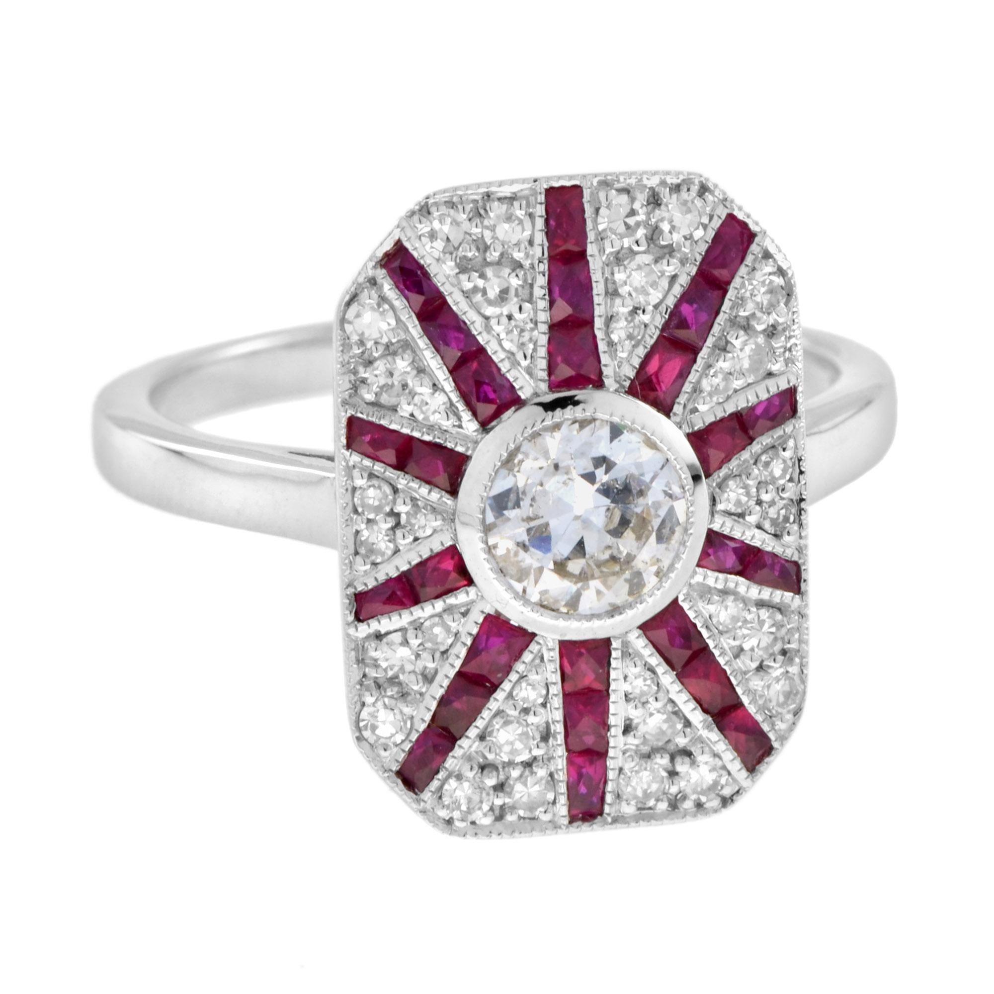 A stylish diamond and ruby ring crafted in 18k white gold. Old cut diamonds total an estimated 0.48 carats. French cut rubies total an estimated 0.75 carats. Art Deo in style, the ring highlight a candy stripe of rubies set into the octagonal mount,