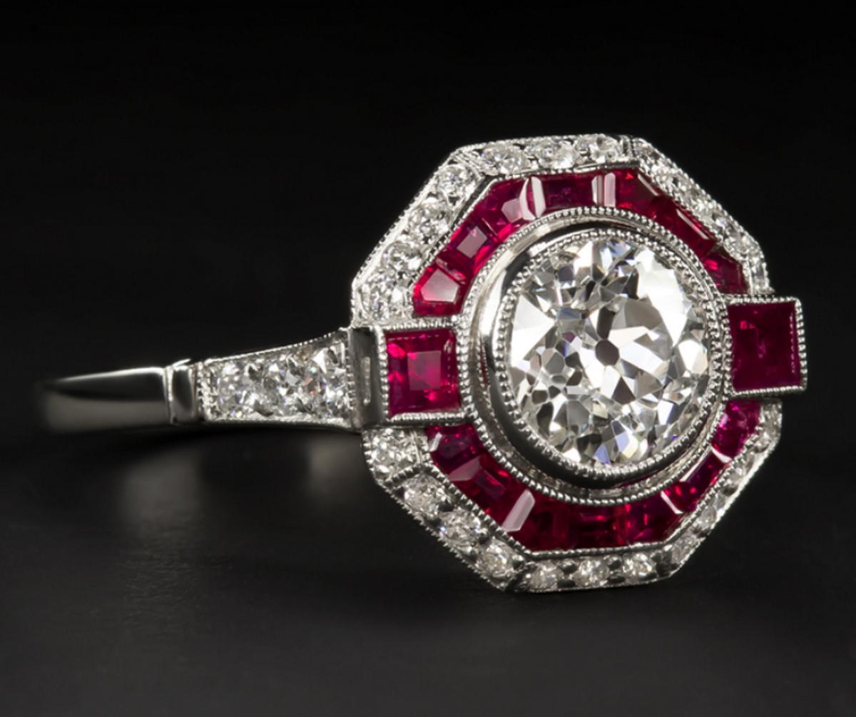 Beautiful ring with an amazing old European cut diamond weighing 1.05 ct. The frame is in platinum and is studded with rubies. The center stone was cut by hand during the 1920s and 1930s.

The ring is of recent construction, and is the work of