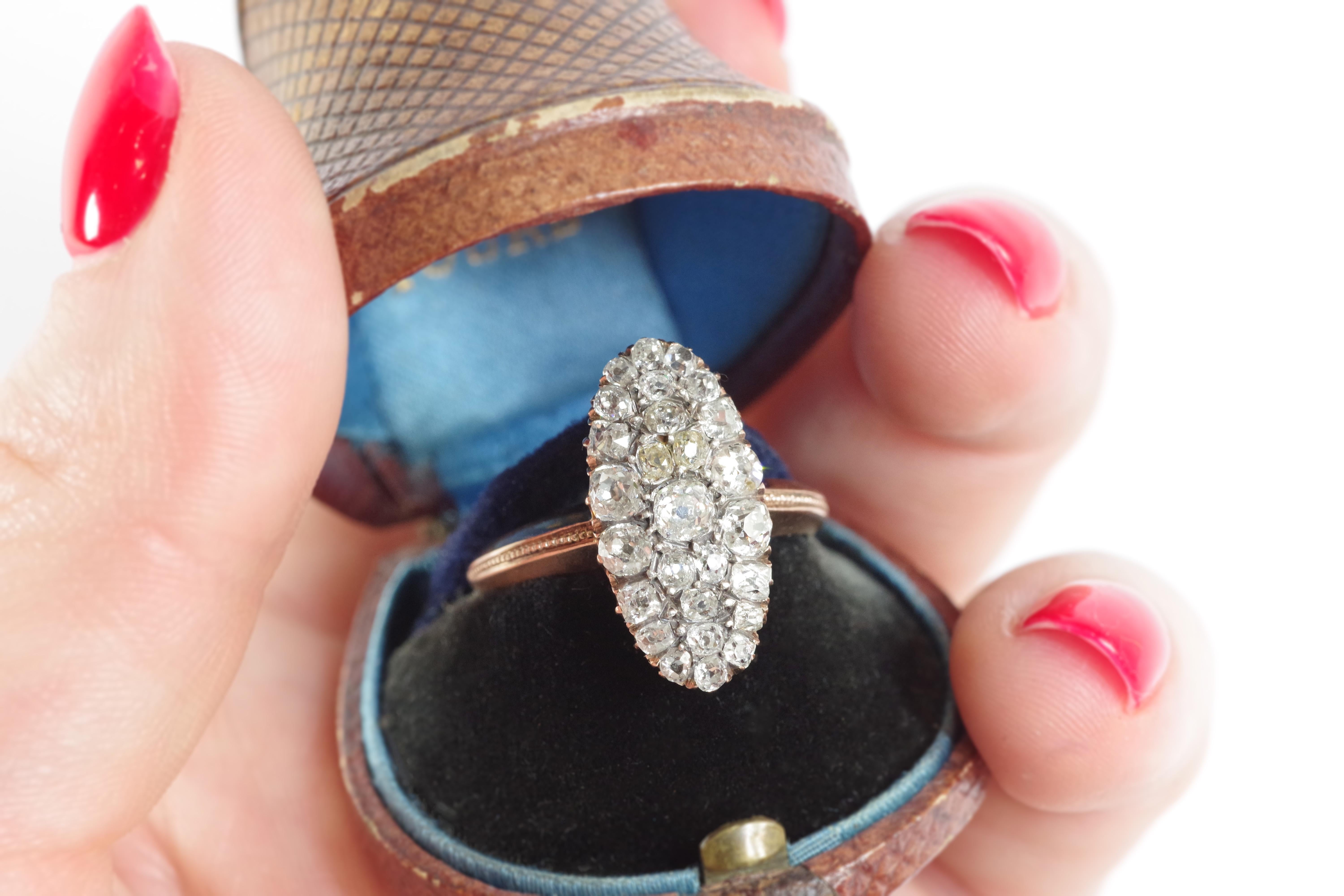 Old-cut diamond marquise ring in 18 karats rose gold. Oval-shaped ring set with 27 old-cut diamonds (approx. 0.95 carat total). The ring is decorated with a line of small dots in relief. Antique ring, late 19th century, Circa 1880, probably France