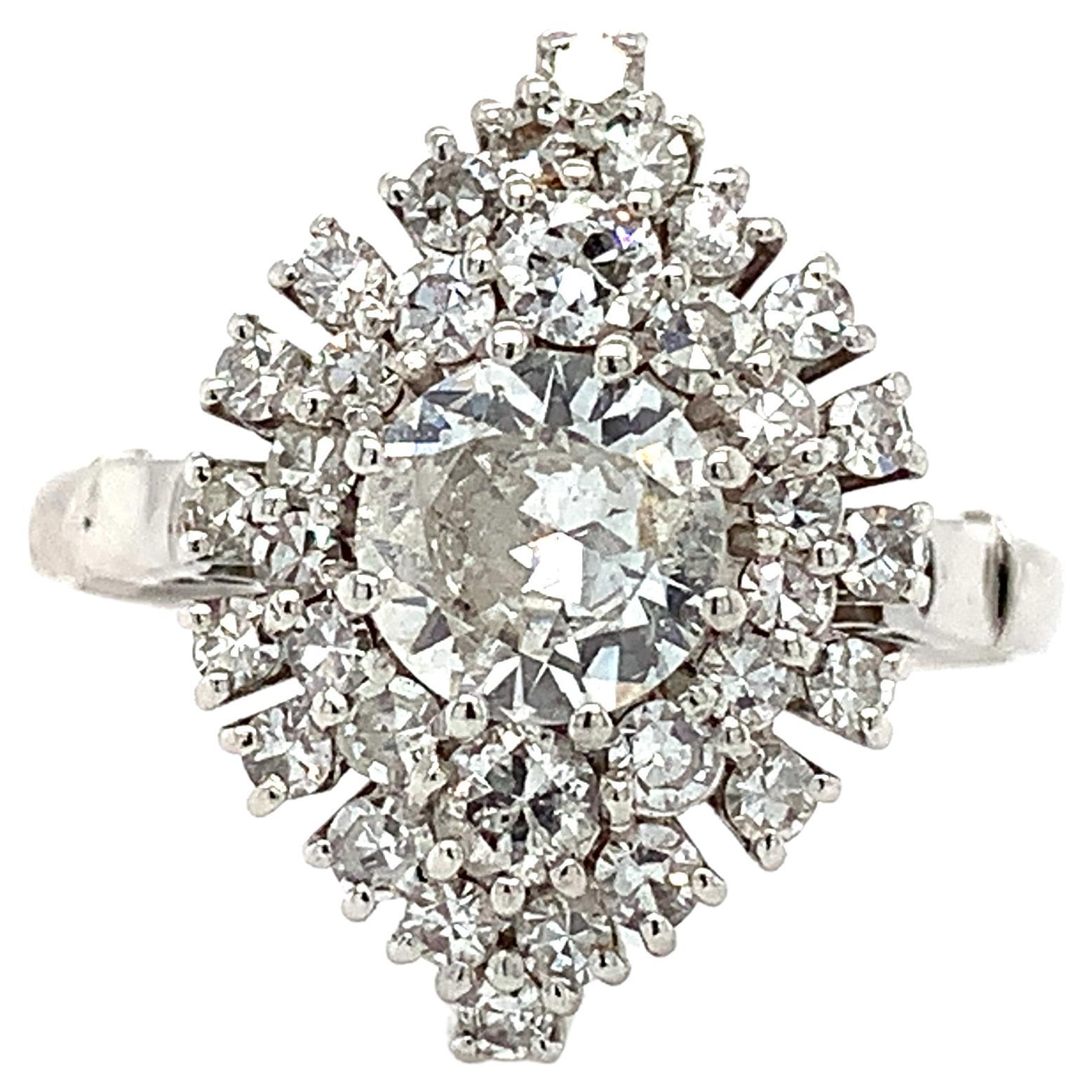 Old cut diamond marquise set engagement ring platinum