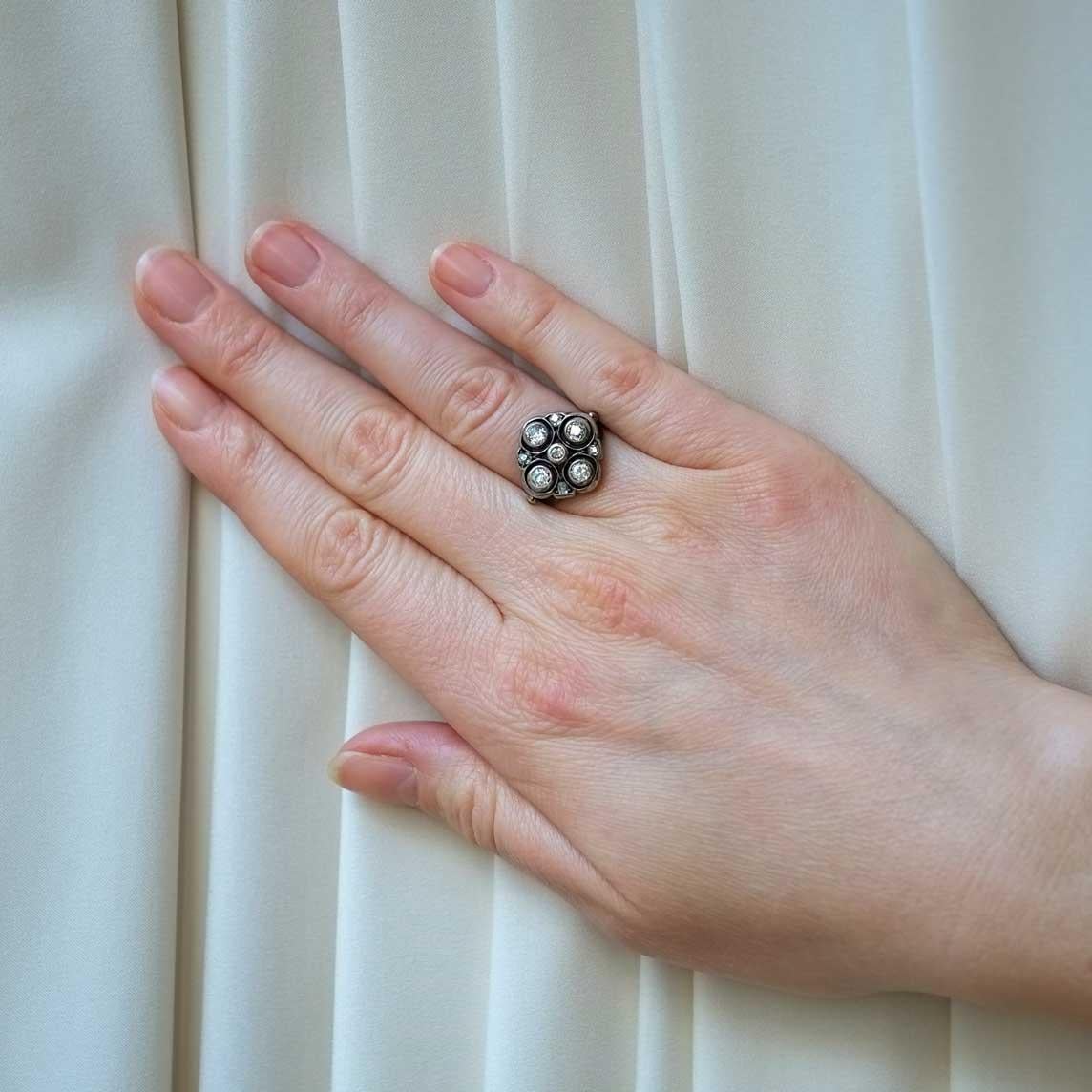 Beautiful ring from the early 1900s set in silver (top part) and gold with old mine cut diamonds for circa 1.10ct total.
Slight oxidation of gold and silver - can be polished if requested to remove patina (however not recommended to preserve antique