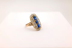 Old-Cut Sapphires Surrounded by Cluster of Old-Cut Diamonds