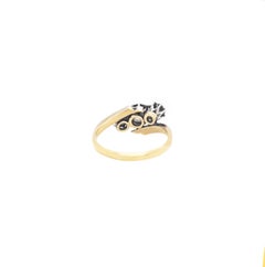 Old Cut Three-Stone Twist 18 Carat Gold and Platinum Ring, circa 1920s