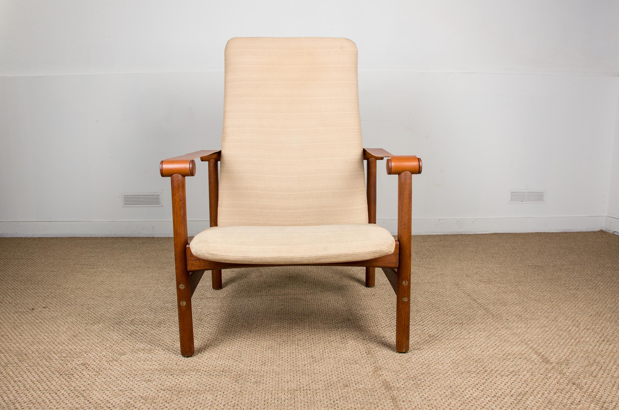 Amazing Scandinavian highback chair with refurbished leather armrests, brass screws and old teak woodwork. The seats are in excellent condition (new foam), the fabric can be changed to your liking. Very elegant, this piece of furniture is in the