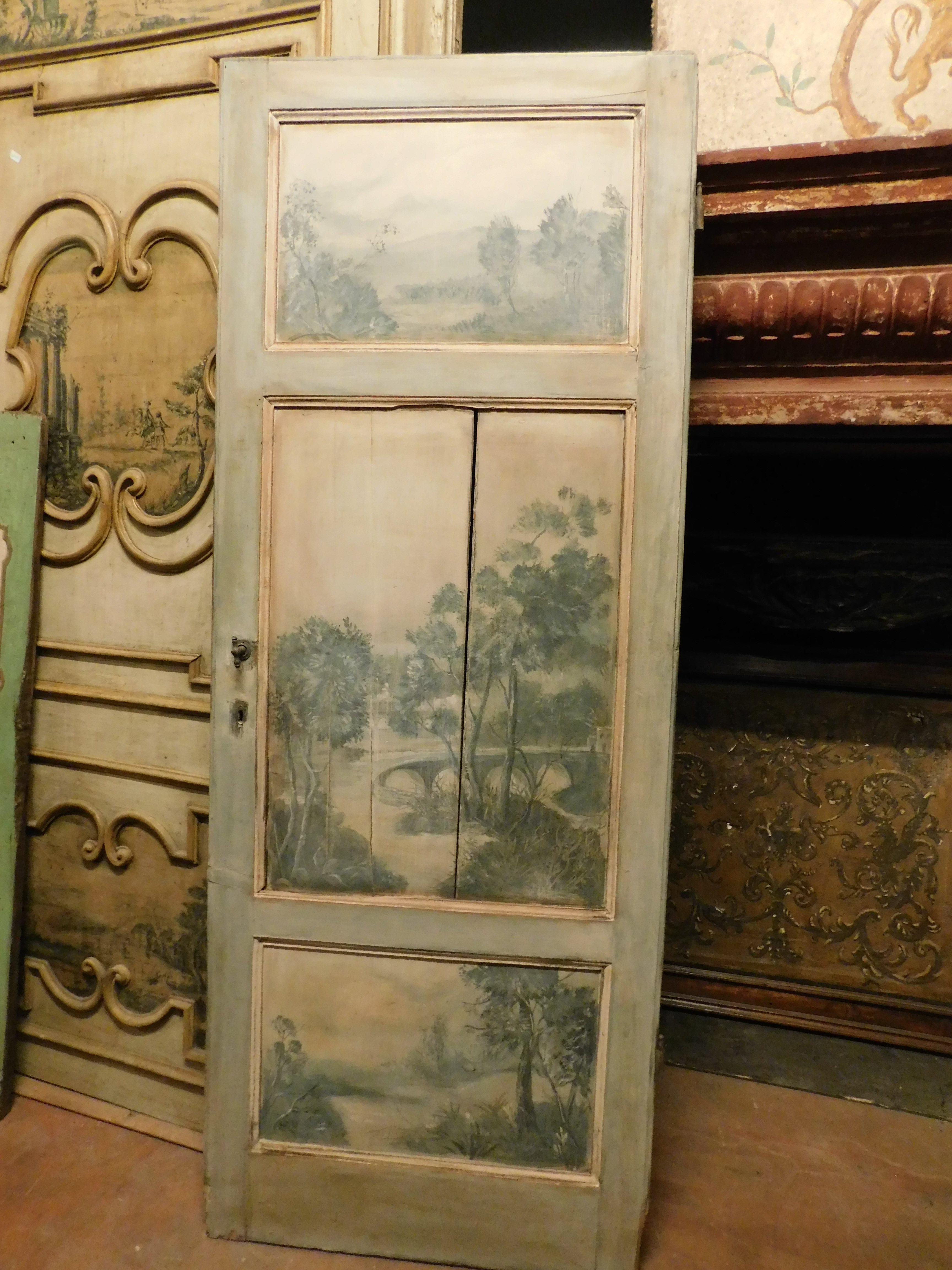 Ancient single door, for interior and without frame, hand painted with a very rich period landscape, divided into 3 panels with a predominance of light blue and grey, handmade by an artisan artist, from Northern Italy, 19th century, maximum size cm
