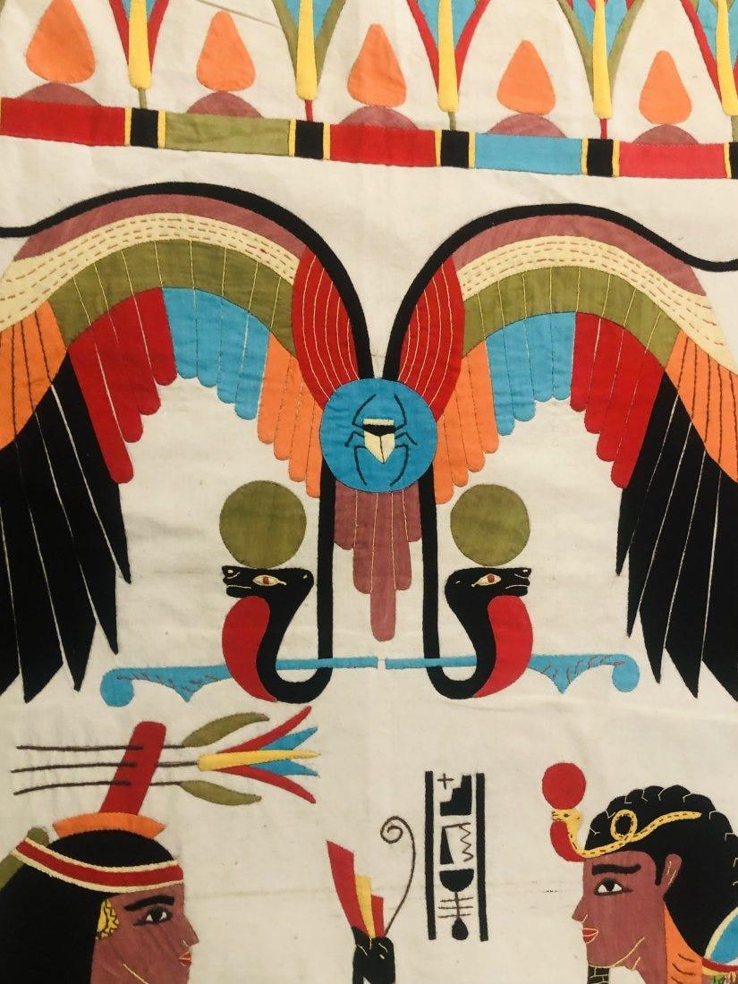 An early 20th century Circa 1940 Egyptian Applique tapestry presenting vibrant colors on a rectangular shaped cotton panel 
Dimensions 77 inch L by 33 inch W.