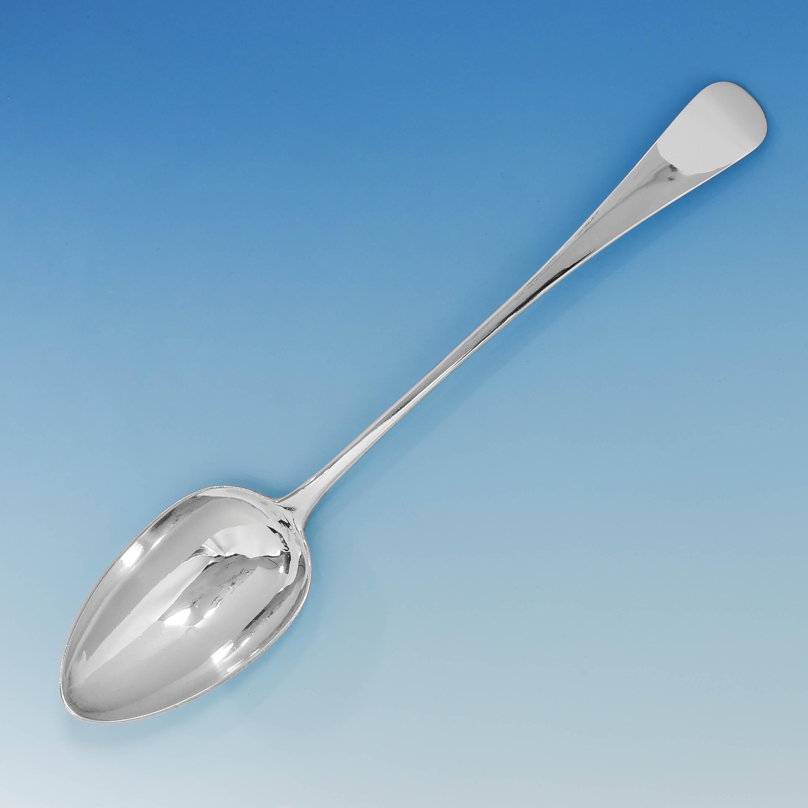 Hallmarked in London in 1815 by Solomon Hougham, this handsome, Regency Period, antique sterling silver basting spoon, is in 'Old English' pattern. The basting spoon measures 12