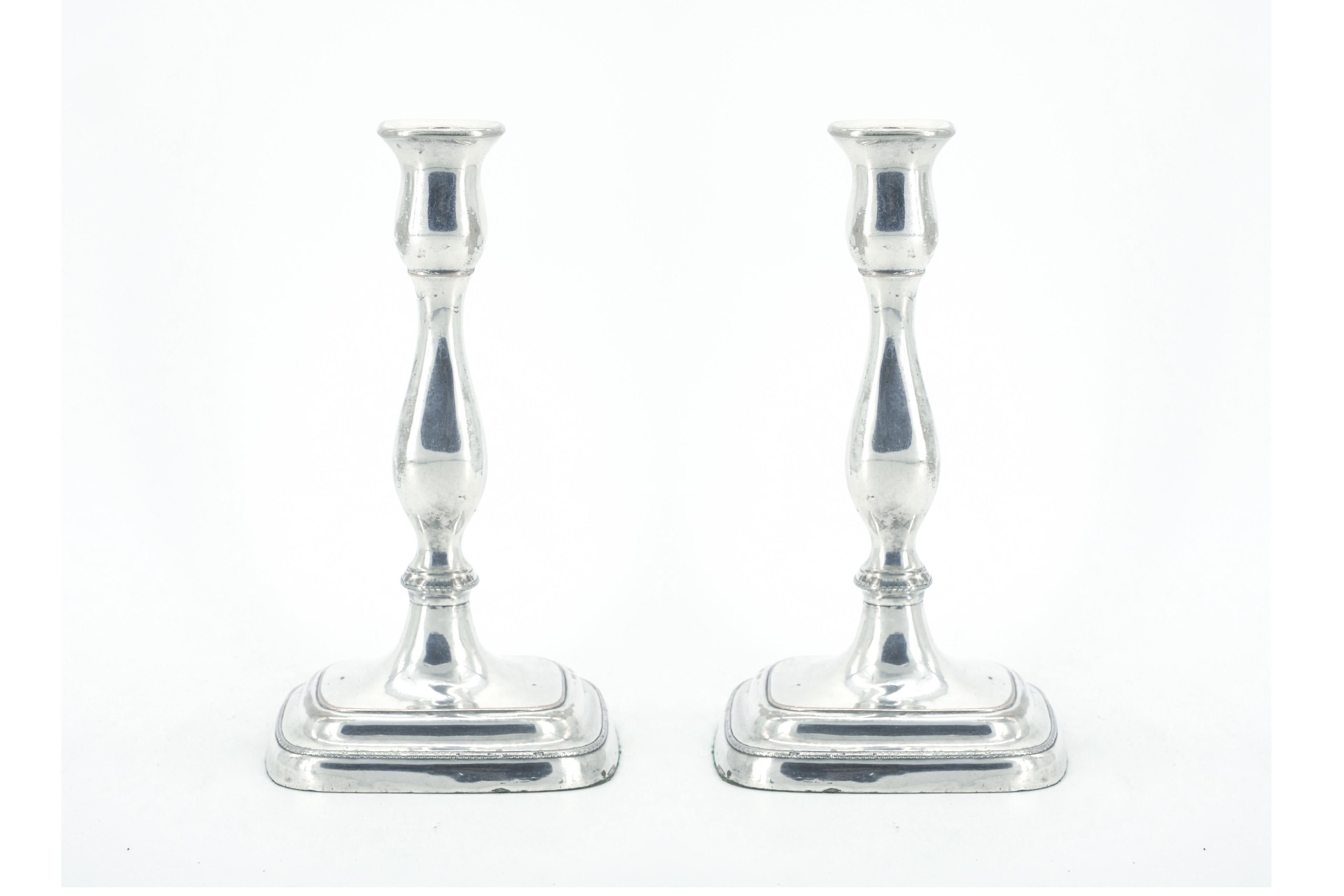 
Illuminate your space with a touch of timeless elegance using our extraordinary old English Sheffield silver plate tableware pair  of two arm candelabra. This remarkable set offers a unique feature, allowing you to effortlessly transform them into