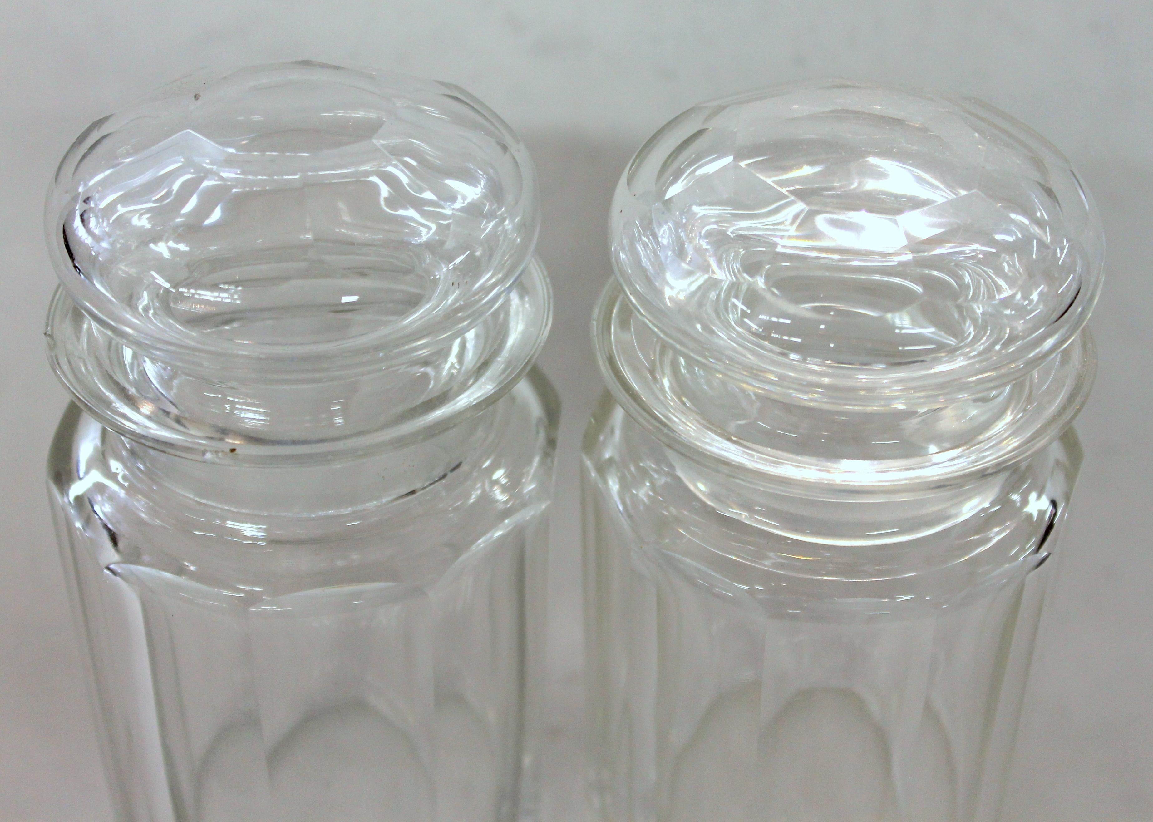 Fine quality hand-cut panel cut crystal double jar pickle set
Maker's Marks for Royal warranted silversmiths, Elkington and Co., Birmingham, with original cypher date mark for 1884
Minor chips noted to top edge of one jar and 