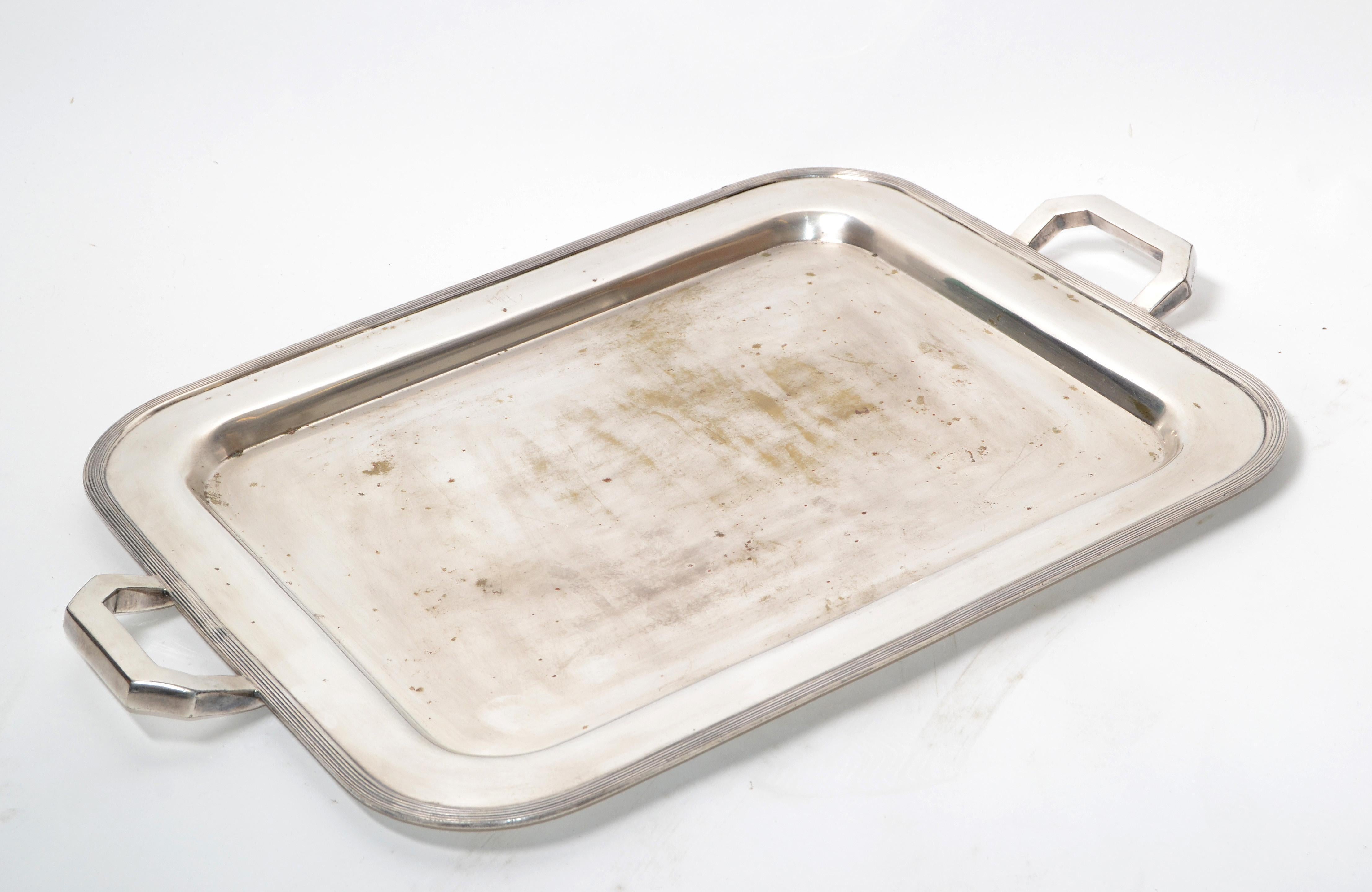 British Colonial style old English silver plate over nickel rectangular serving tray, platter with ornate border.
It is in original vintage condition and has some stains and is tarnished.
Trade Mark D and numbered at the base.
Serving Tray Size: