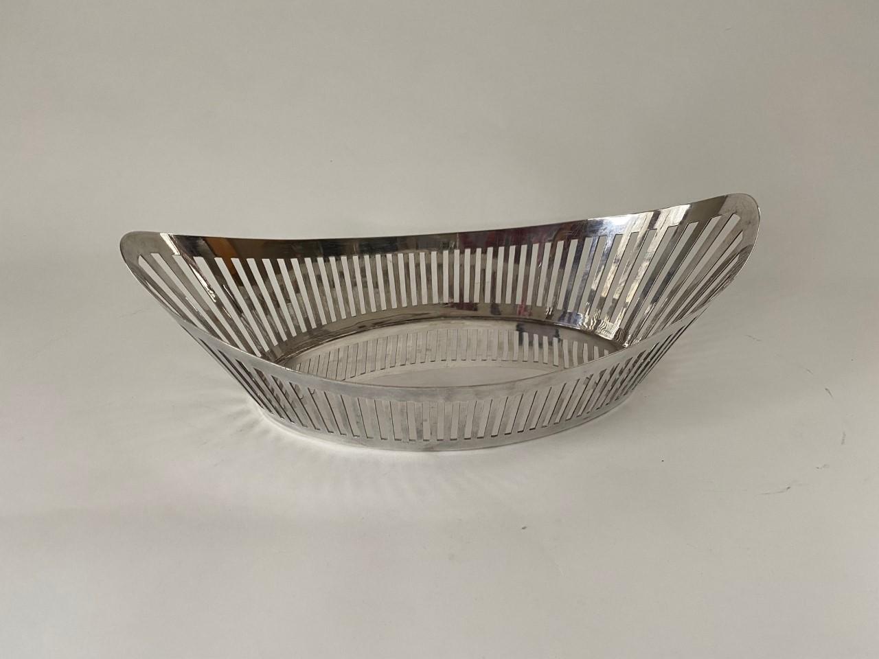 Old early 20th century English silver plate pierced bread basket.