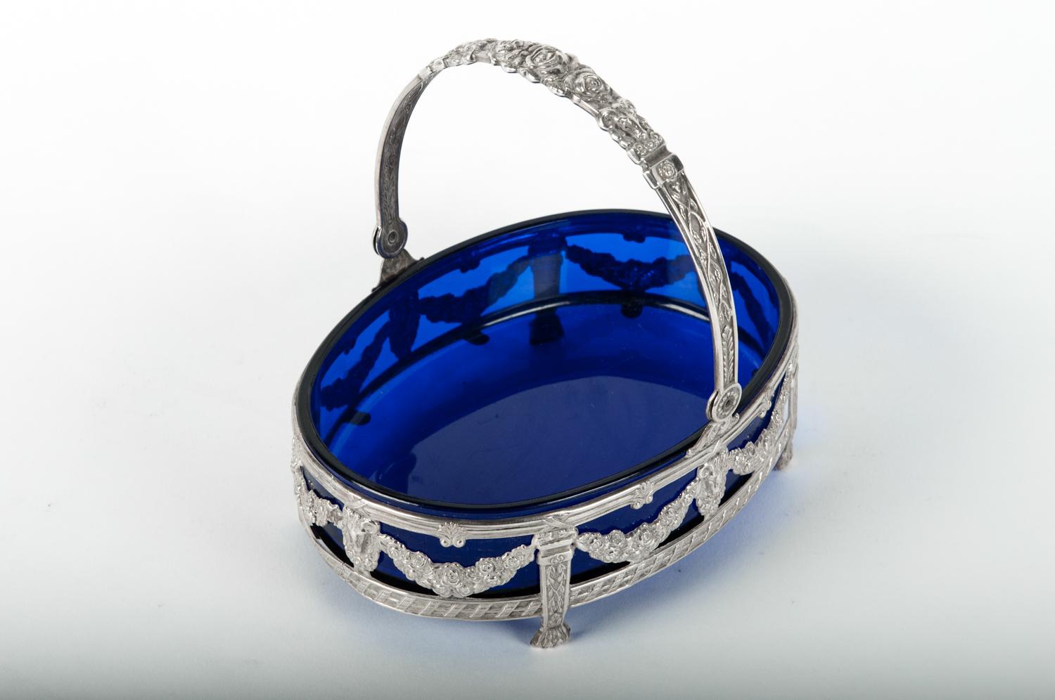 Old English sterling silver framed footed barware or tableware dish with cobalt blue glass liner. The piece is in great condition. Minor wear consistent with age or use. The dish stands about 6 inches high x 6.5 inches diameter.