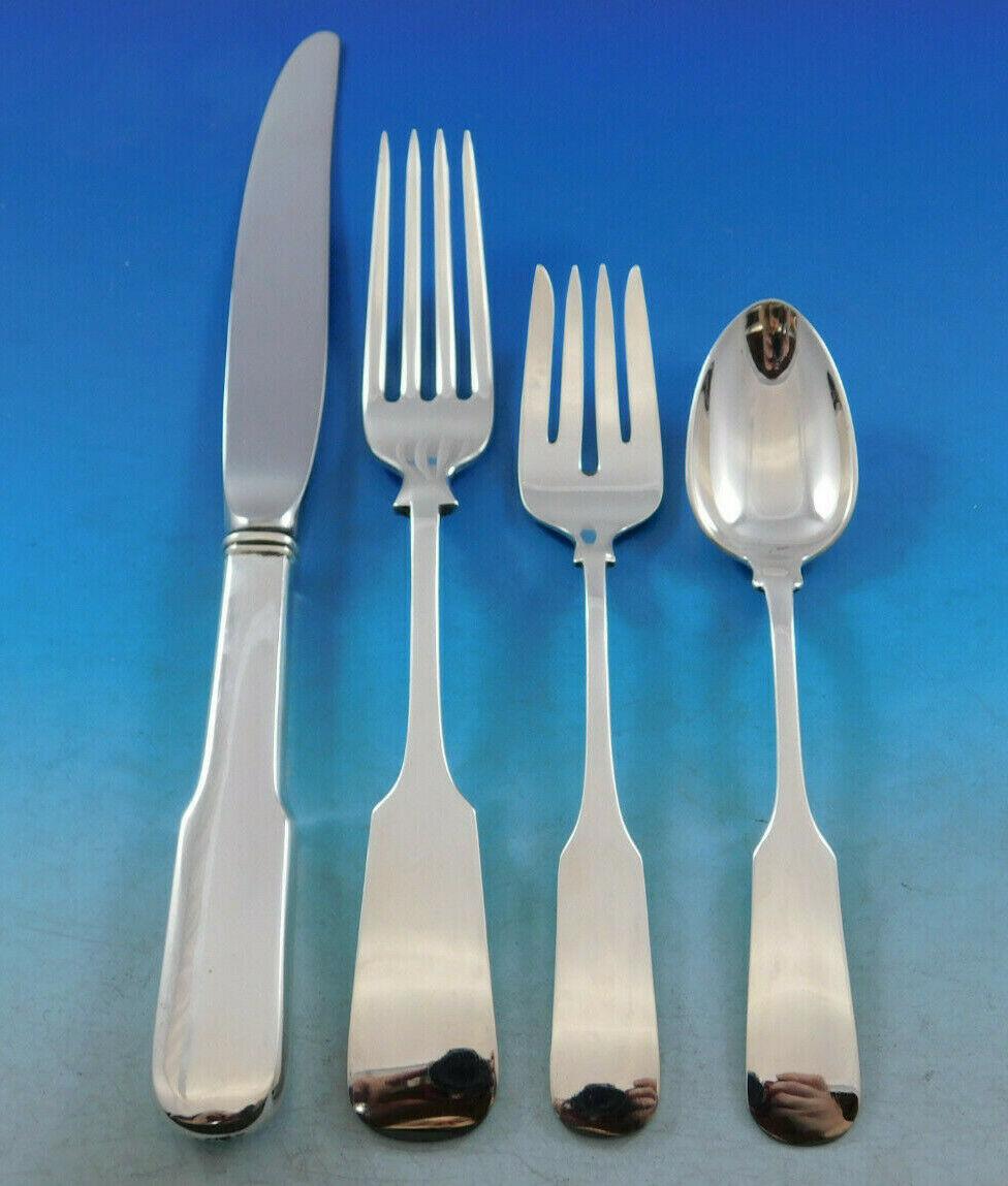 The Old English Tipt pattern was introduced by Gorham in the year 1870. It is a plain pattern with a straight tip, creating a simple, timeless, rectangular fiddle shaped design.
 
Dinner size old English Tipt by Gorham sterling silver flatware set,