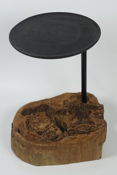 Old Eroded Wood with an Iron Stick a Table Top Made of Mango Wood