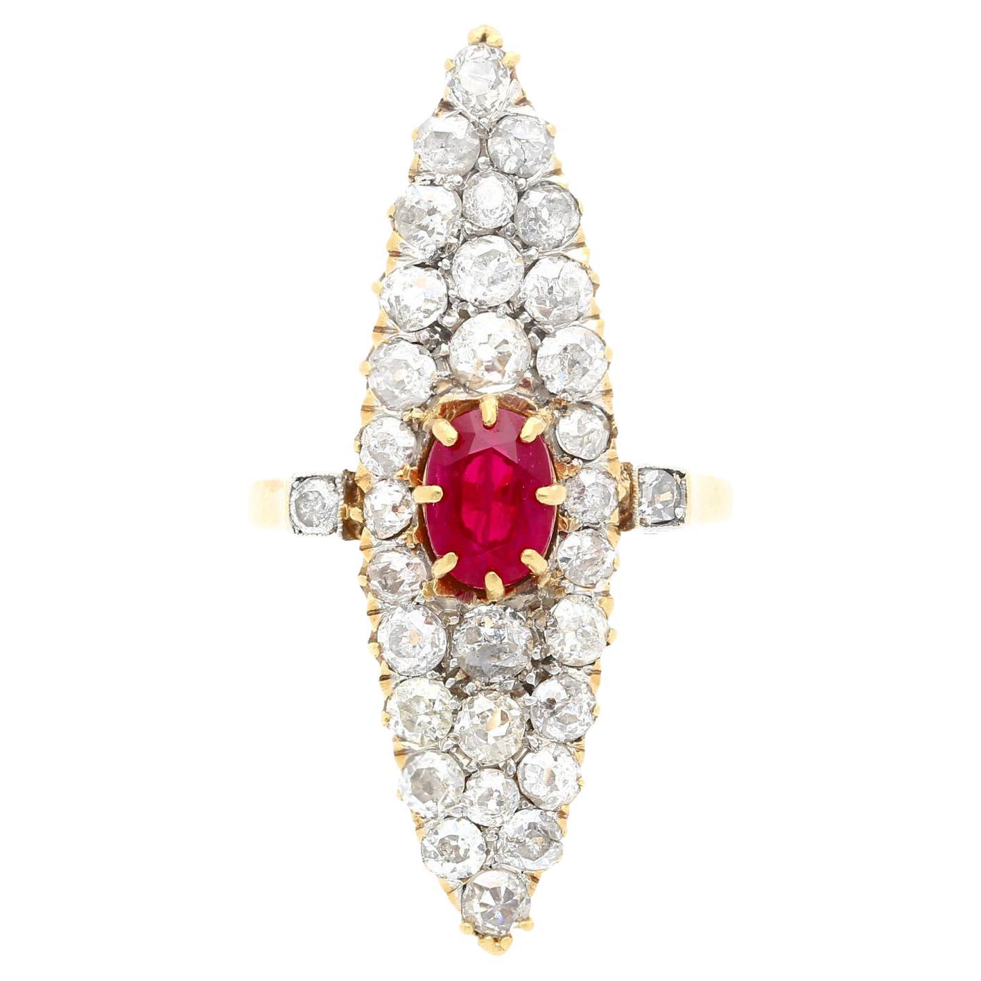 This unique 14K yellow gold old-cut cocktail ring, featuring a Ruby and Diamond design, will sit comfortably and attractively on your finger. With its intricate, vintage design, it radiates a luminous sparkle that will surely be the center of