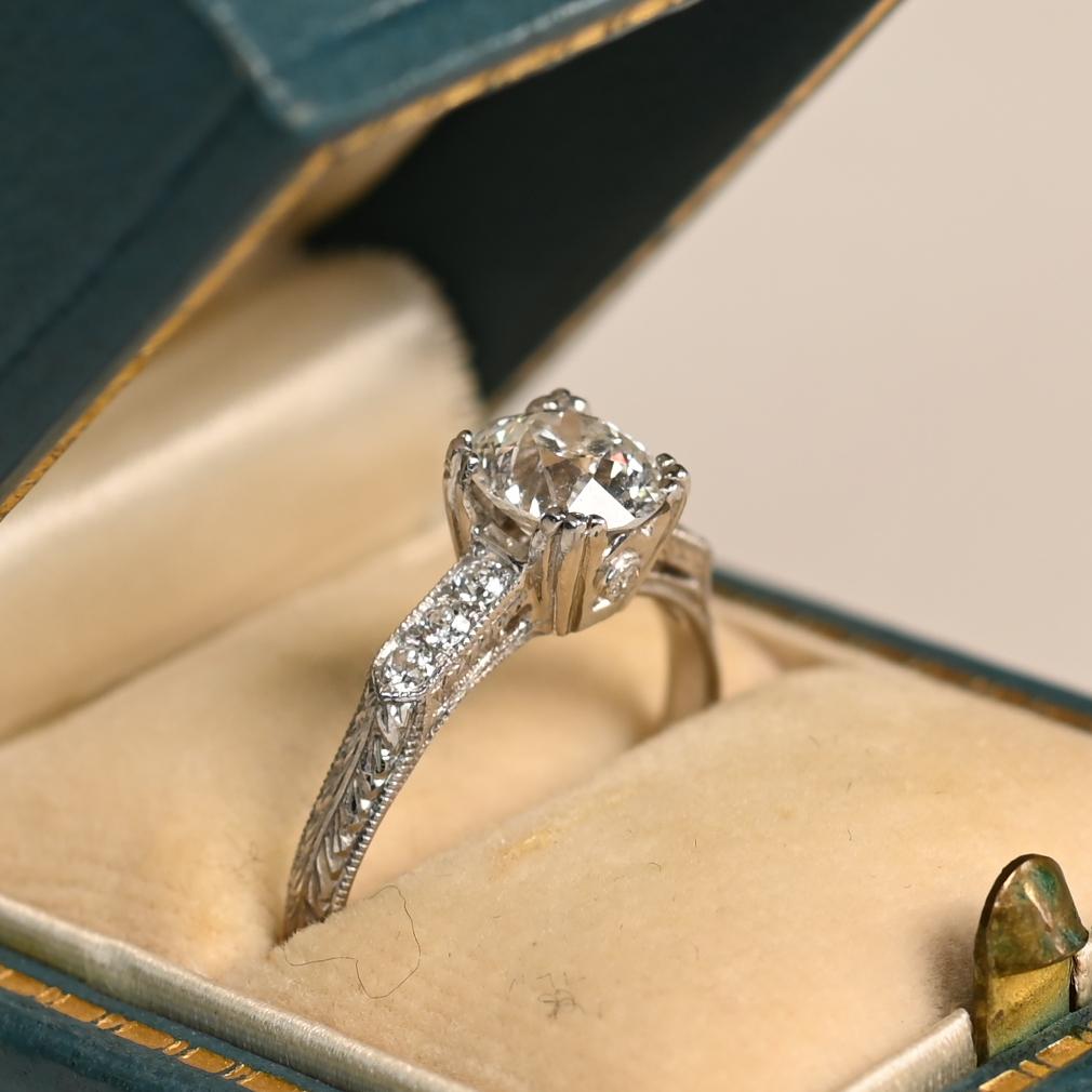 This exquisite platinum engagement ring showcases a breathtaking approx. 1.00-carat old European cut diamond, certified by GIA for its exceptional quality. With a G color grade and SI1 clarity, the center stone radiates timeless brilliance.