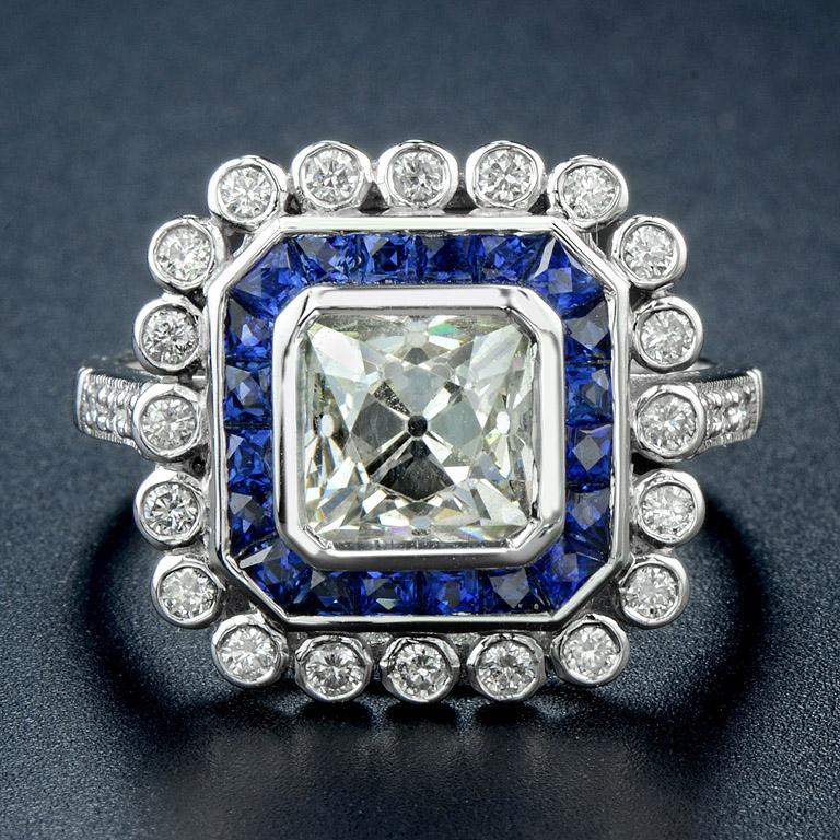 Old European Cut Diamond 1.77 Carat set with Blue Sapphire 1.30 Carat and small Diamonds 0.40 Carat

The ring was made in 18K White Gold size US.7
*Guarantee Genuine Diamond
**Full Refund if found fake

DC (1-1.77 ct.), S-S (20-1.3 ct.), DC-ST MIX