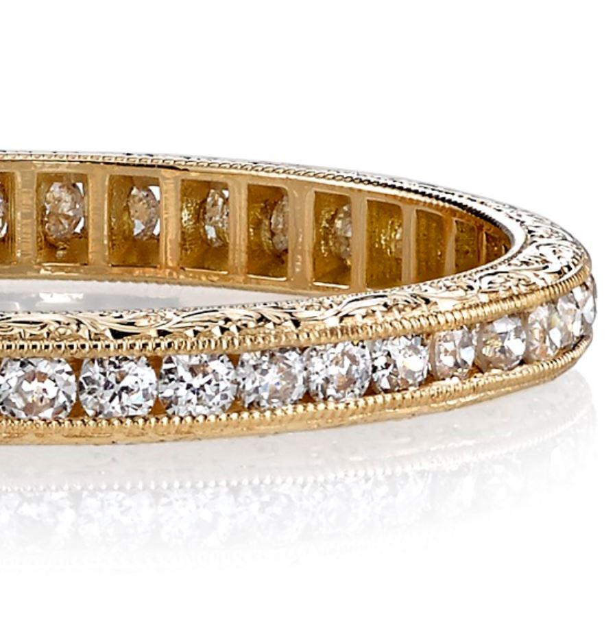 Approximately 0.40tw old European cut diamonds channel set in a handcrafted 18k gold channel set eternity band with engraved sidewalls. 

Approximate band width 2.1mm.

Our jewelry is made locally in Los Angeles and most pieces are made to order.