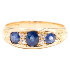 Bague vintage en or jaune 18 carats avec diamant de taille européenne ancienne et saphir bleu 