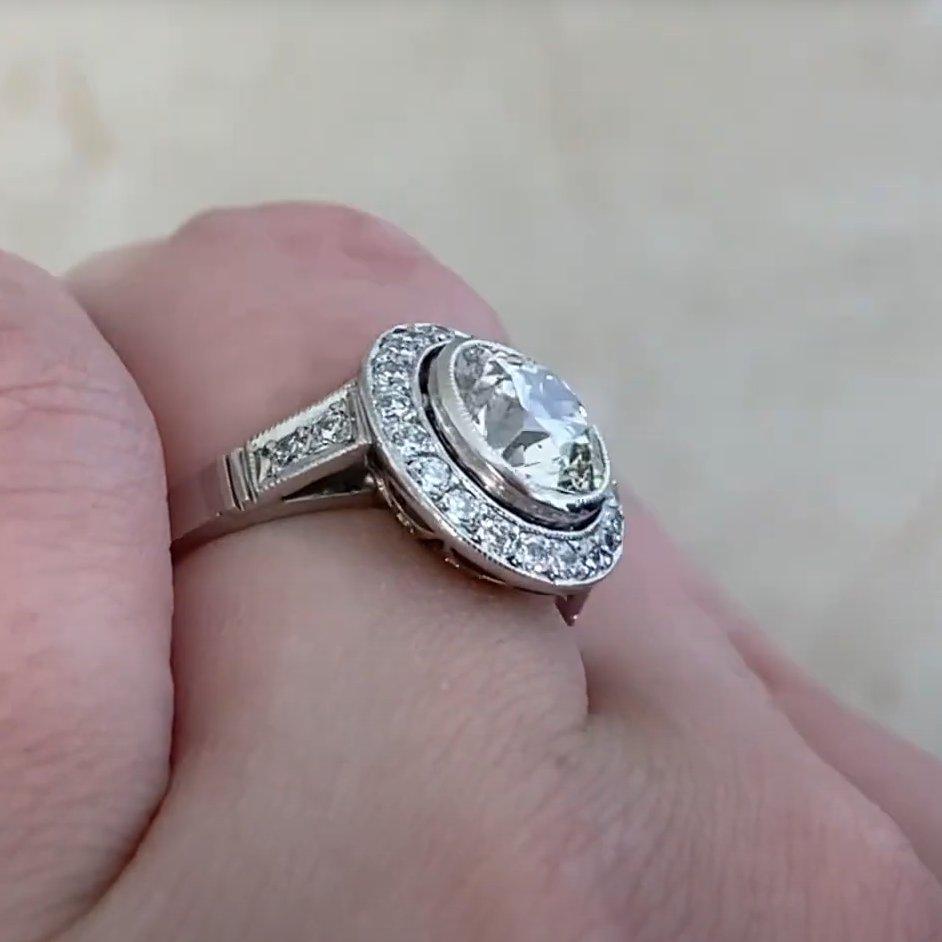 Taglio antico europeo Anello di fidanzamento aureolato con diamante vecchio taglio europeo (circa 1,4 carati), platino in vendita