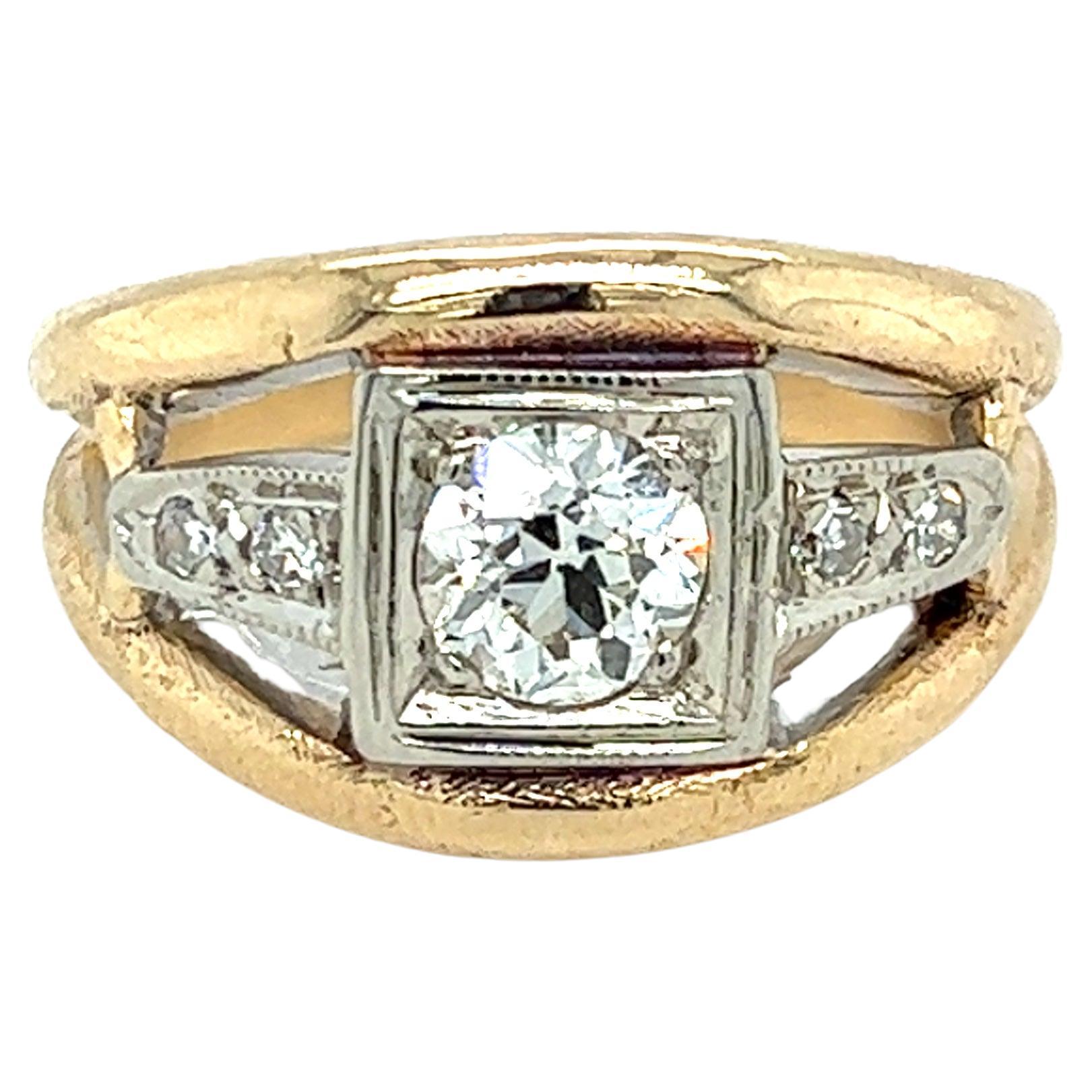 One 14 karat yellow and white gold (stamped 14K) custom design ring set with one old European cut diamond, approximately 0.76 carat with J color and SI1 clarity and four (4) single cut diamonds, approximately 0.12 carat total weight with matching