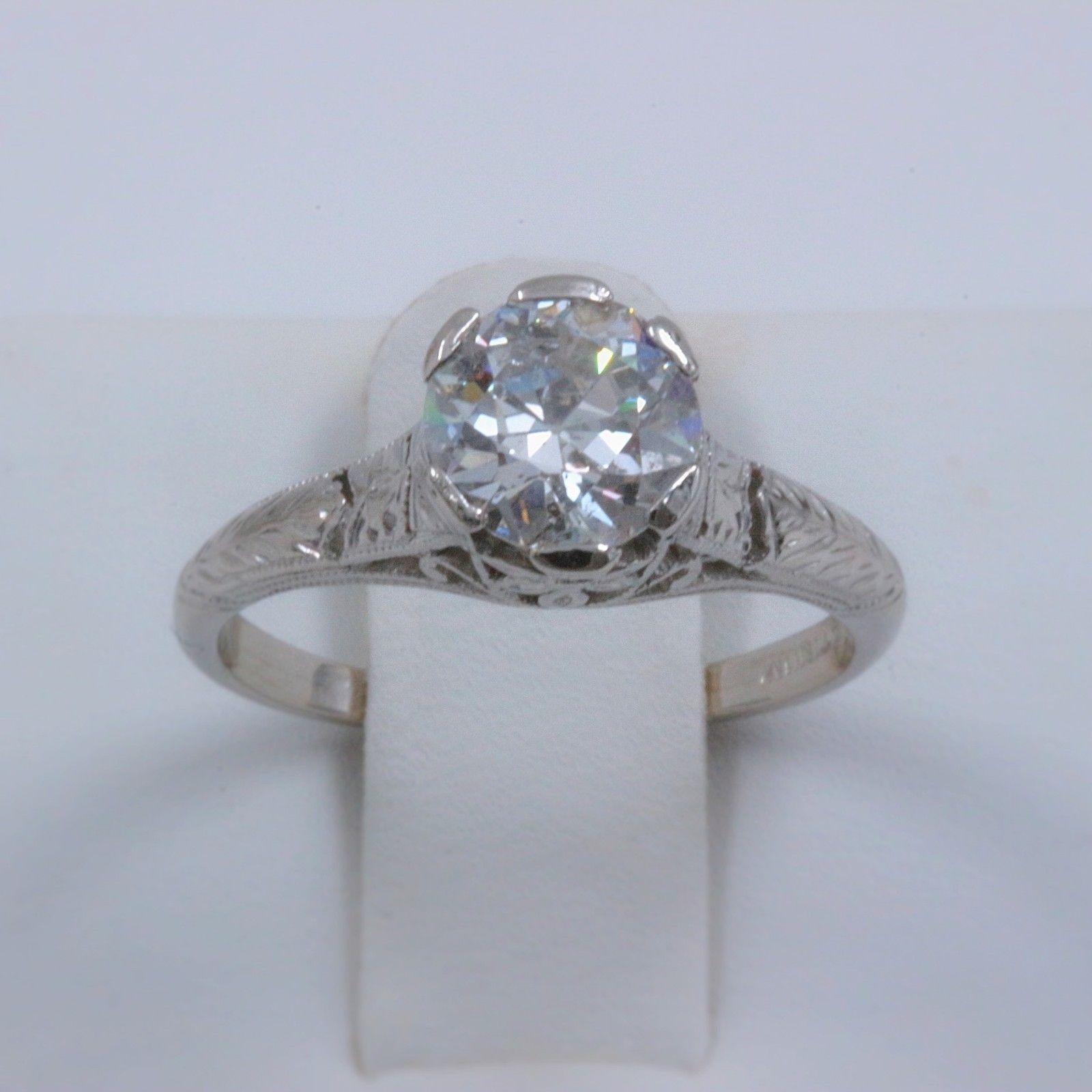 OLD CUT DIAMOND Solitaire Engagement Ring
Metal:  Platinum
Size:  6 - sizable
Total Carat Weight:  1.05 cts
Diamond Shape:  Round European Old Cut
Diamond Color & Clarity: J I1
Hallmark:  PLATINUM
Includes:  Certified Appraisal - Elegant Ring