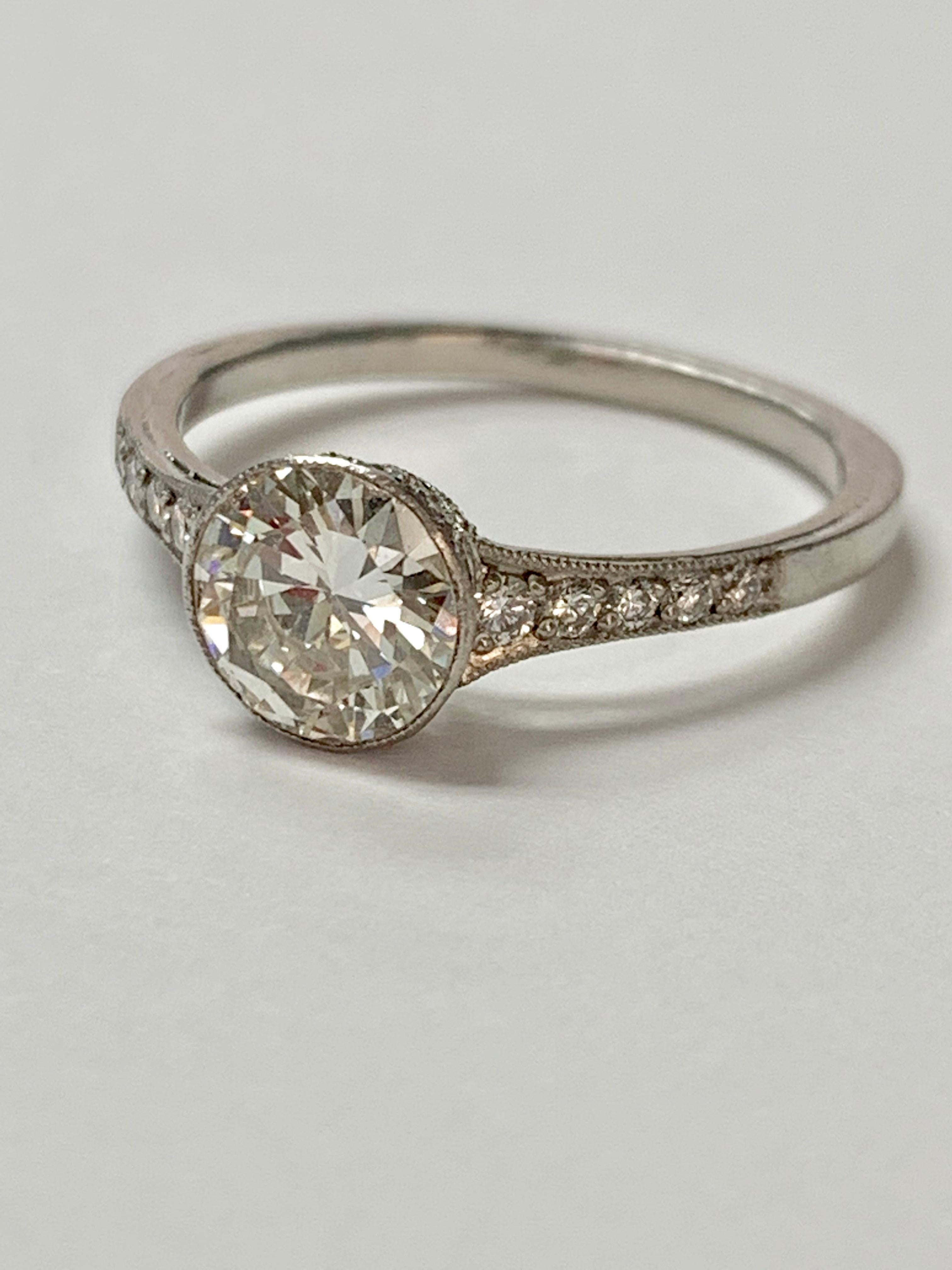 Old European Cut Diamond Engagement Ring In Platinum. 
The details are as follows : 
Diamond weight: 1 carat ( I color and SI clarity )
Diamond melee weight: 0.30 carat 
Metal: Platinum 
 