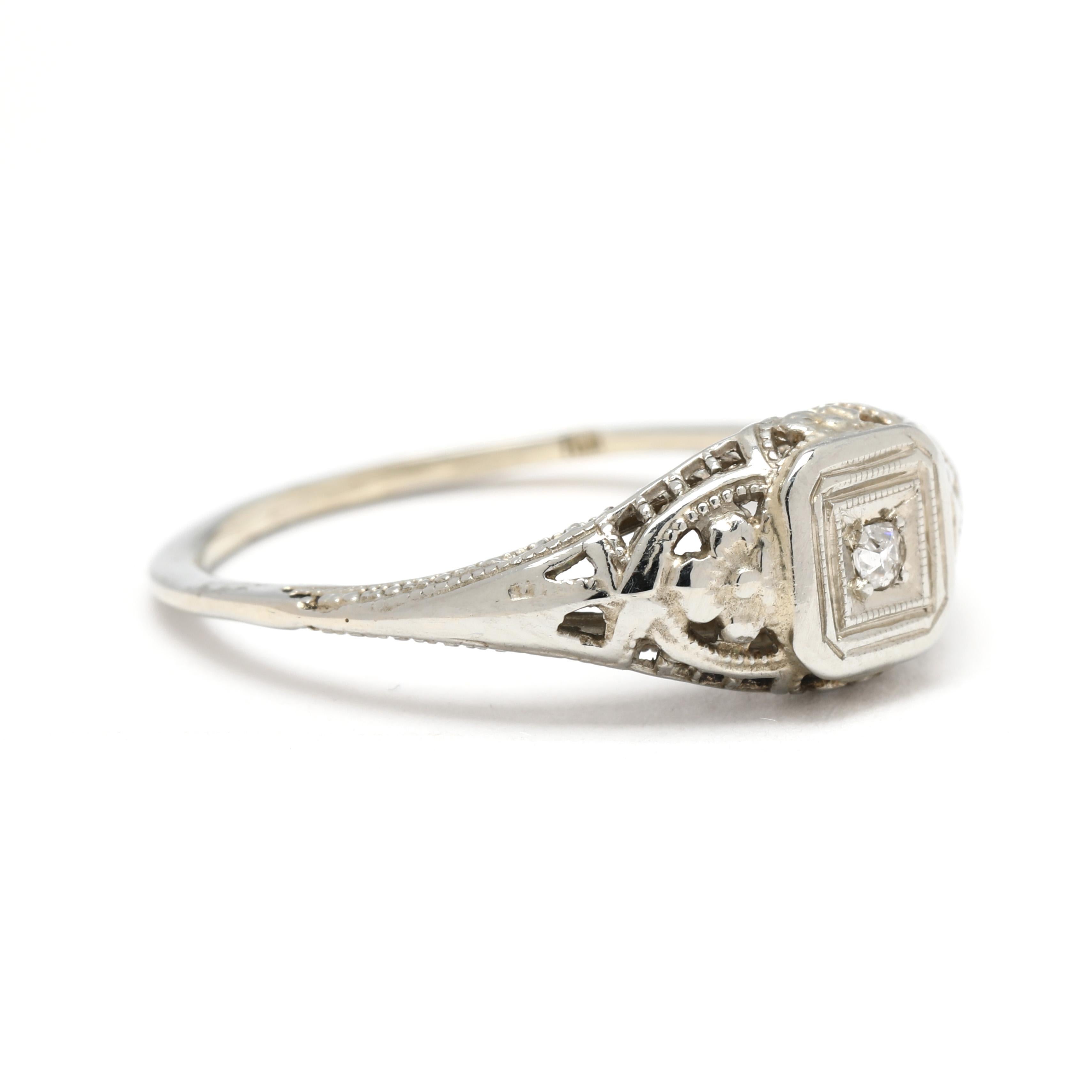 Celebrate timeless romance with this stunning Old European cut diamond engagement ring, set in elegant 18k white gold. This intricate filigree design showcases vintage craftsmanship, with delicate detailing that enhances the brilliance of the