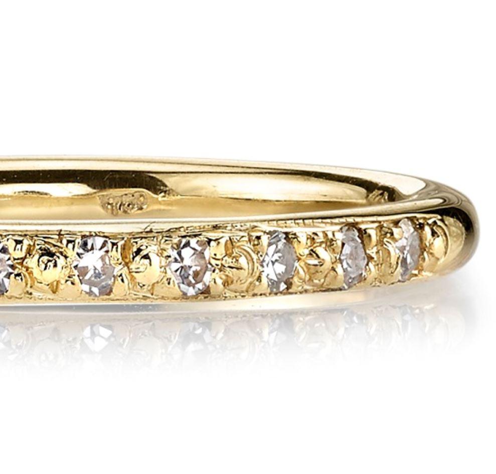 Approximately 0.10ctw old European cut diamonds pavé set in a handcrafted 18K gold half eternity band. 

Price may vary according to total diamond 
weight.
Approximate band width 2mm. 

Our jewelry is made locally in Los Angeles and most pieces are