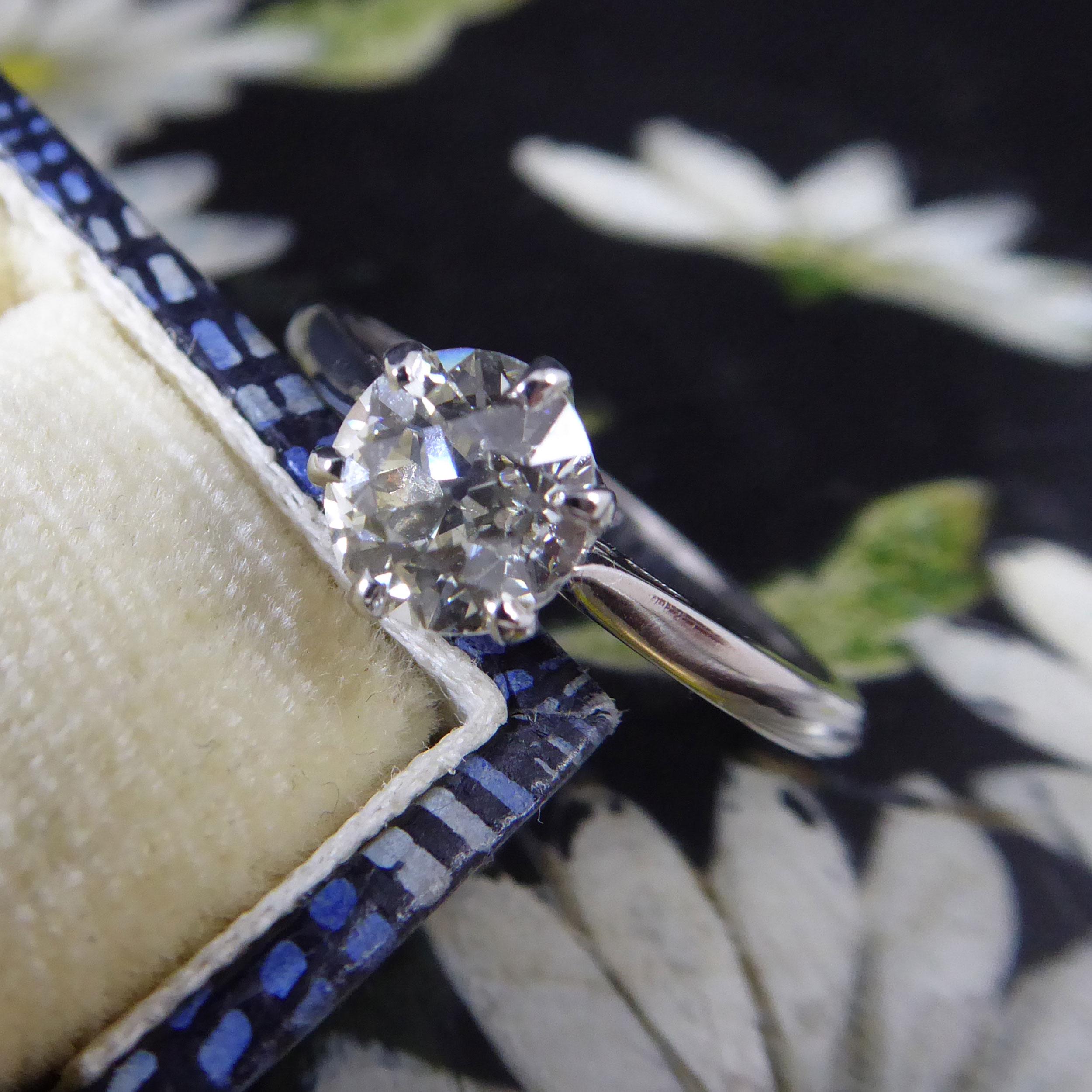 Unfortunately, as lovely though this diamond is, the ring it came in was just too worn for us to sell on.  We have, therefore, remounted the diamond in a new but traditional style ring in keeping with the design of the original.  The ring holds a