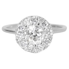 Anillo de diamantes talla europea antigua con halo festoneado de diamantes