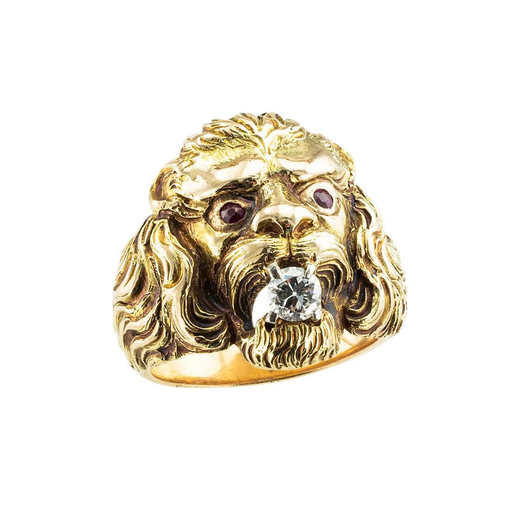 Vintage lion’s head yellow gold ring with ruby-set eyes and a diamond in its fangs circa 1930. *

ABOUT THIS ITEM:  #R-DJ615F. Scroll down for detailed specifications.  This lion’s head ring is a masterpiece in design and workmanship that is rarely