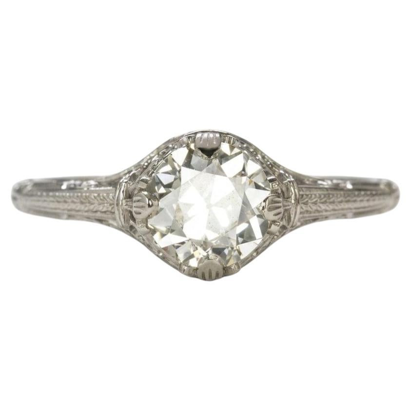 Bague de fiançailles de style vintage en filigrane, avec un diamant taille ancienne européenne en solitaire