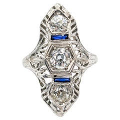 Anello con diamante e zaffiro sintetico dal taglio europeo antico