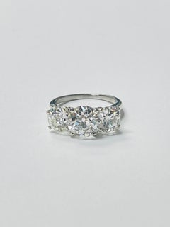 Old mine Cut Diamond Three stone Engagement Ring In Platinum GIA Certified.