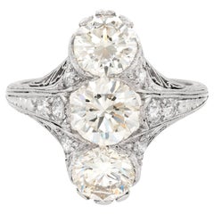 Old European Cut Diamond Vertical Three-Stone Diamond Filigree Platinum Ring