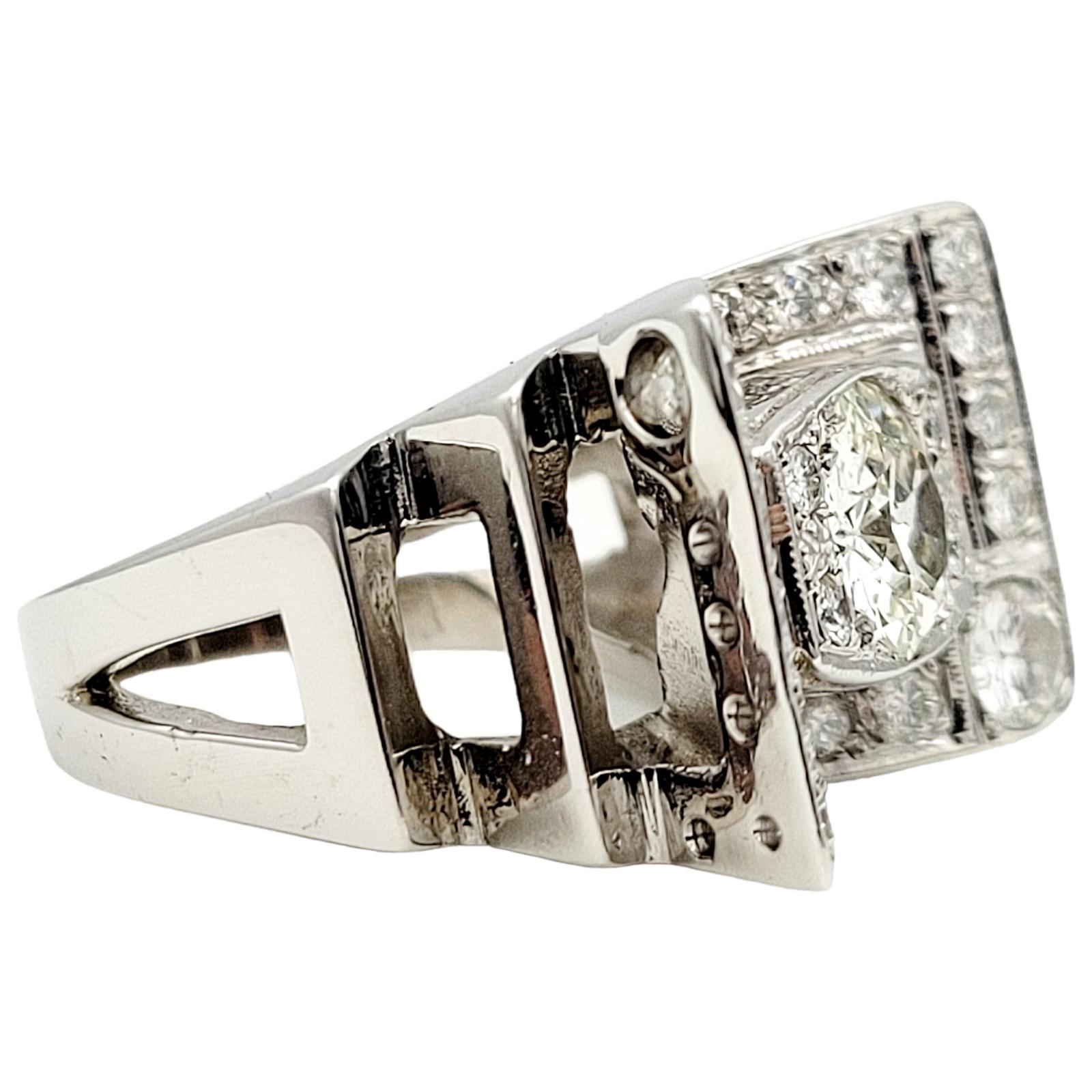 Ring size: 5

Experience the timeless elegance of this exquisite Old European cut & Round Brilliant diamond cocktail ring in 14-karat white gold. Meticulously crafted in an Art Deco style, this ring exudes sophistication and charm, making it a