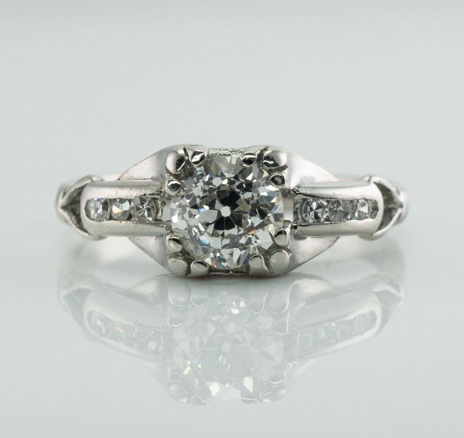 Old European Diamond Ring Platinum Engagement .56 cttw 

This gorgeous estate engagement ring is finely crafted in solid Platinum.
The center Old European cut diamond is .50 carat of a very clean SI1 clarity (tiny feather in the corner) and G
