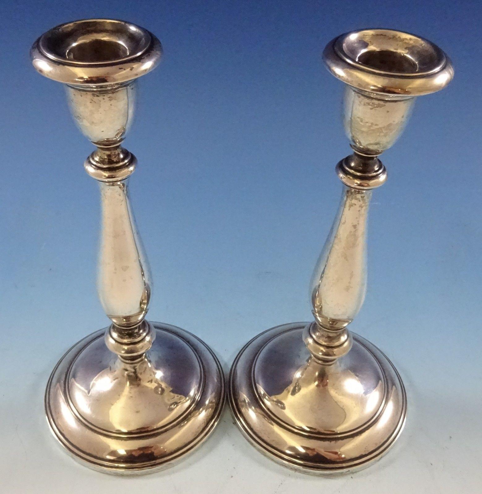Old French by Gorham
Beautiful Old French by Gorham sterling silver candlestick pair marked #663. The pieces are 8 7/8 tall and are weighted. They are not monogrammed and are in very good condition. Marvelous!

 