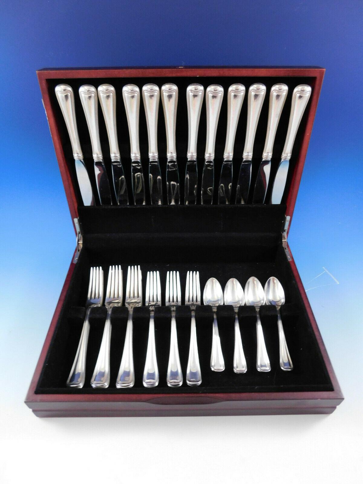 Dinner size Old French by Gorham sterling silver Flatware set, 48 pieces. This set includes:
Reminiscent of Parisian cafes, the clean lines and simple styling of this Classic pattern add a fresh accent to any table décor. First introduced in 1905,