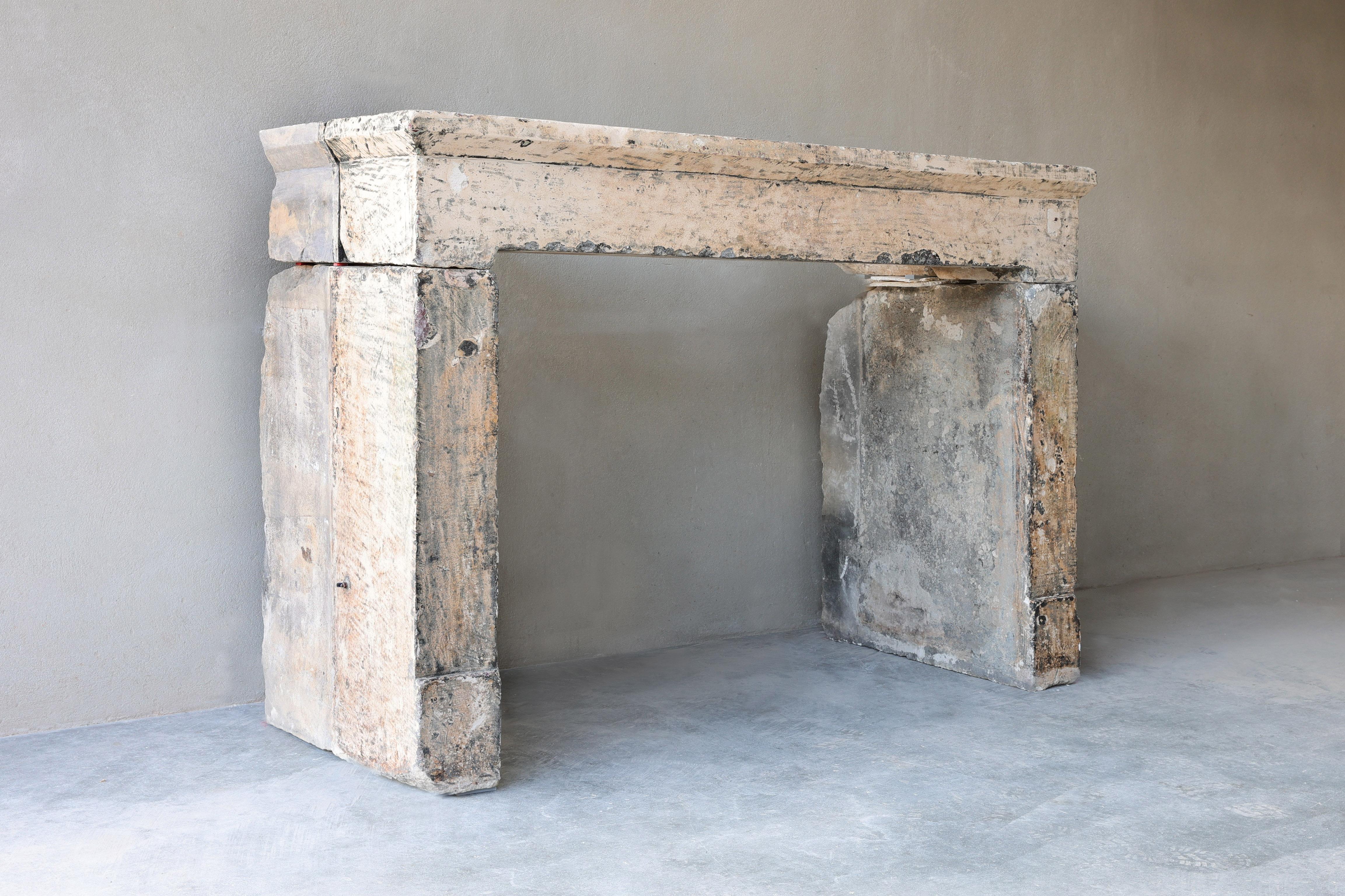 Beautiful rustic fireplace made of French limestone from the 18th century! A fireplace with character and authenticity from the Burgundy region in France.