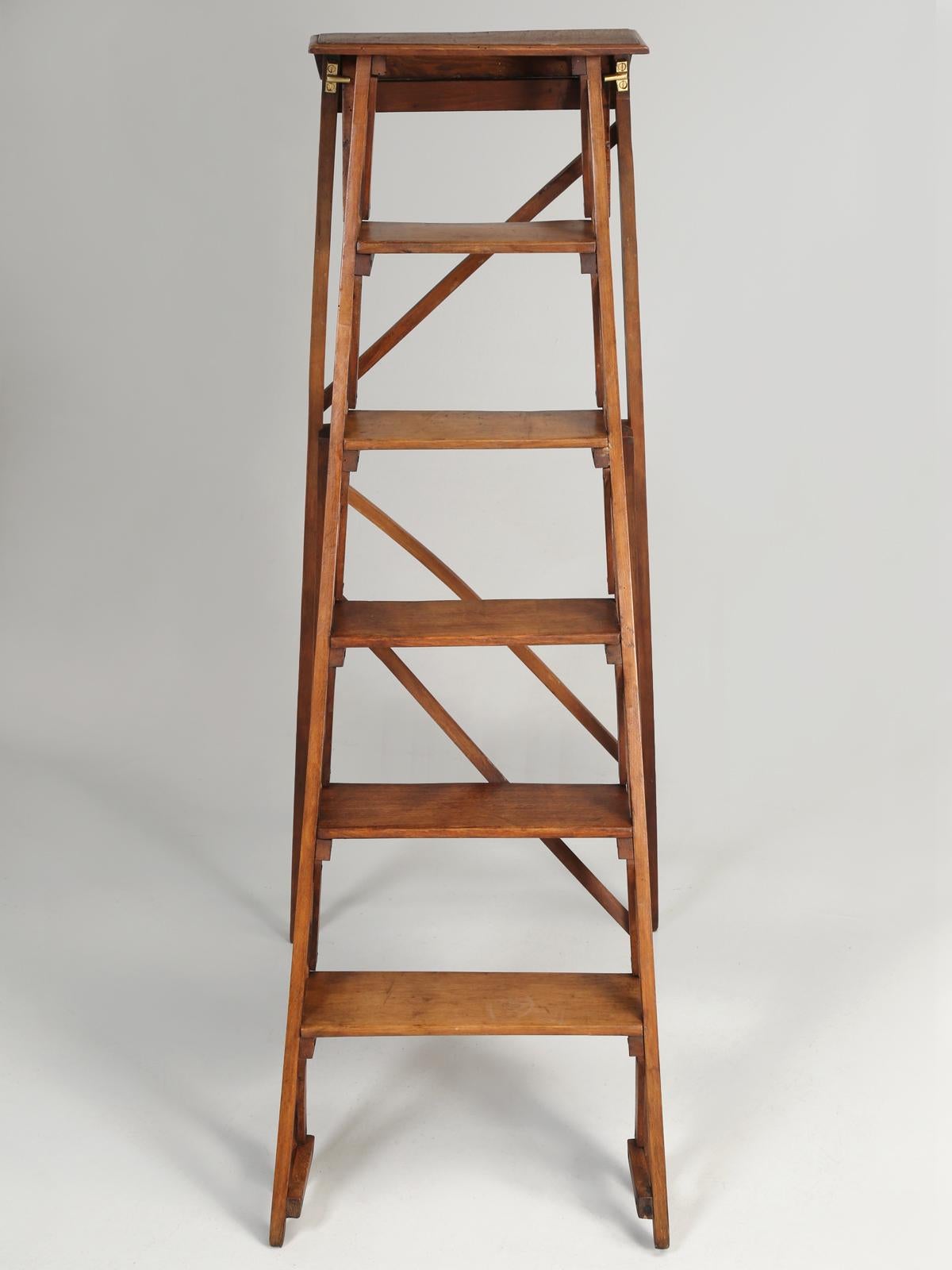 If there was ever such a thing as a good looking folding ladder, then this old French wooden ladder must be it. Wonderful old patina and all we had to do was add a coat of French beeswax to bring the ladder back to life. 
Depth provided was taken