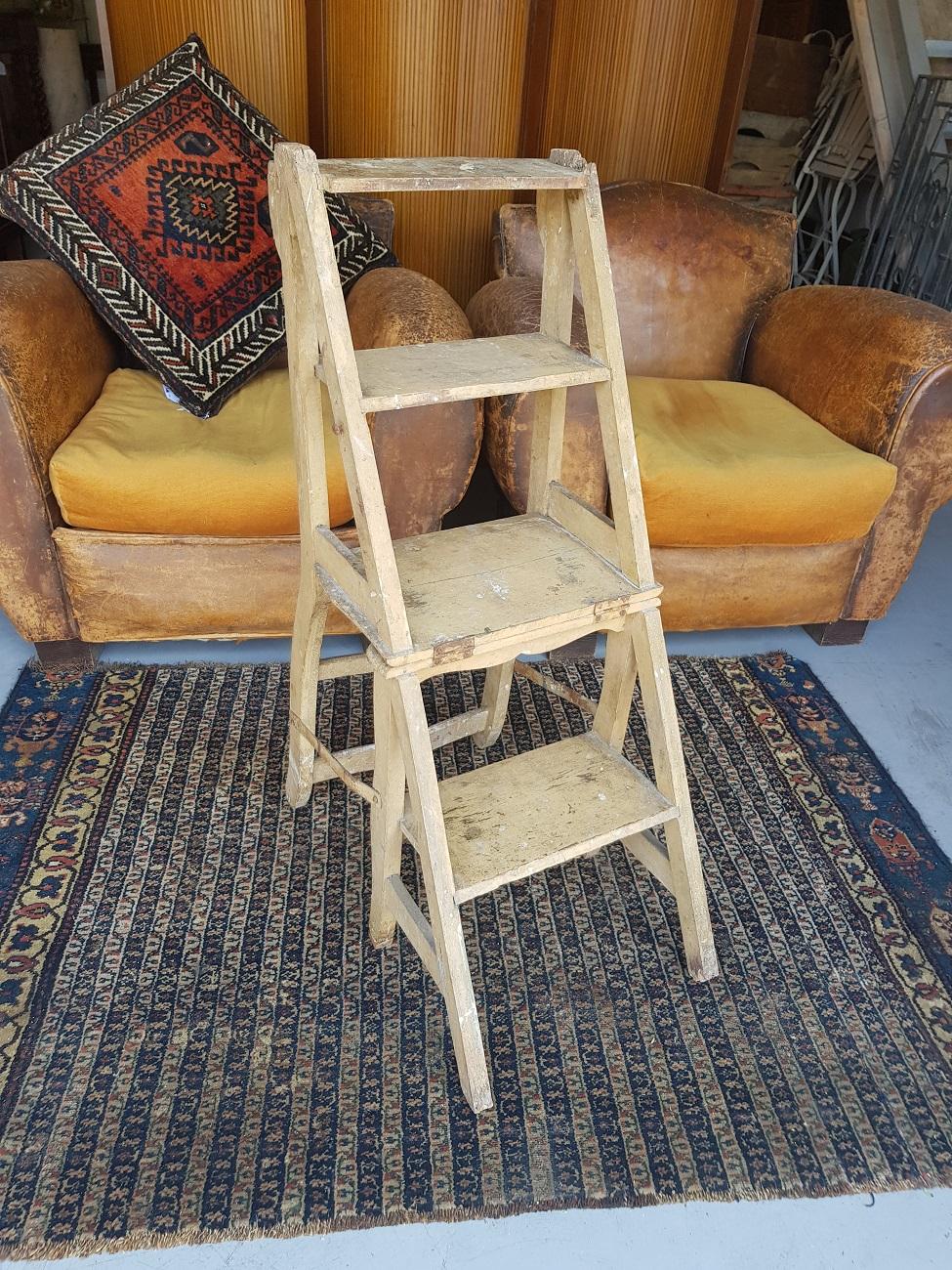 Old French painted pine metamorphic kitchen chair and library steps, from circa 1900.

The measurements are:
Depth 40 cm/ 15.7 inch.
Width 38 cm/ 14.9 inch.
Height 92 cm/ 36.2 inch.
Seat height 45 cm/ 17.7. inch.
 