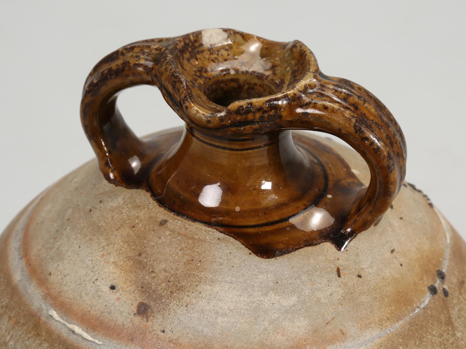 Early 20th Century Old French Walnut Oil Jug Removed from a Chateau from the Hills above Cannes For Sale