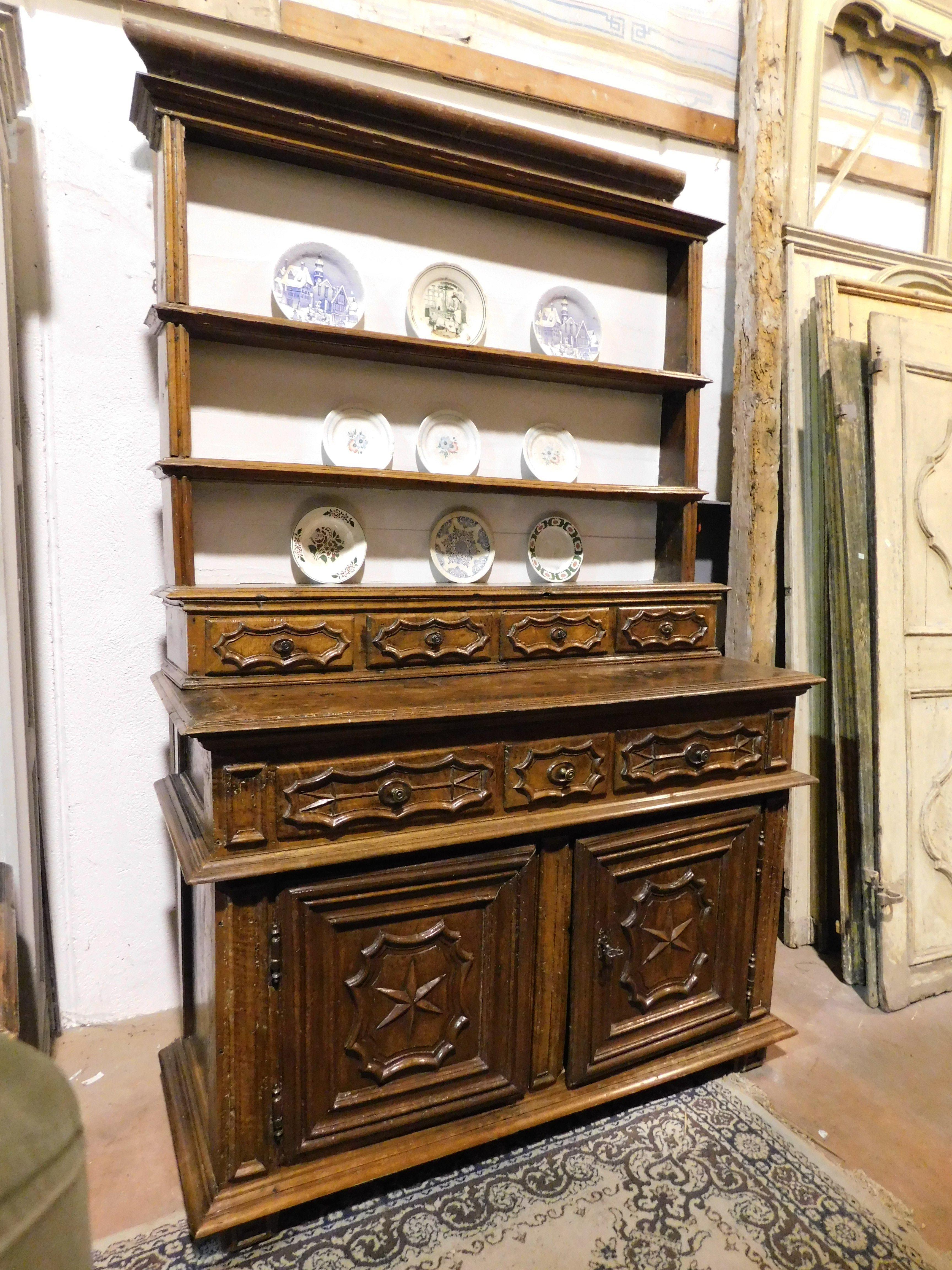 Antique Piattaia piece of furniture, plate holder with drawers and doors, all in richly hand-carved walnut with spider web tiles, from Turin (Italy) from the 19th century, maximum size cm W 165 x H 244 x D 65.
Can be used as a pantry, organizer in