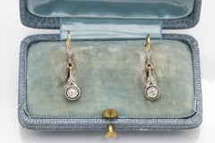 Old gold and platinum earrings with diamonds, first half of the 20th century.